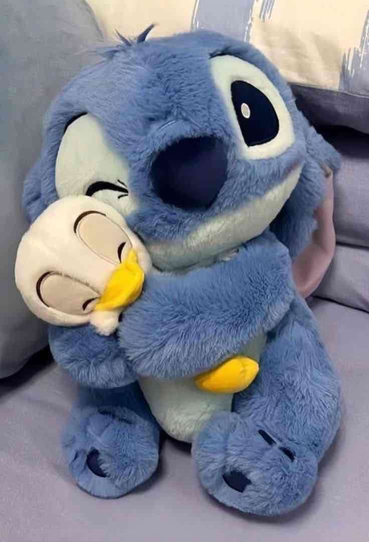 Peluche de Stitch con Pato y stitch rosa