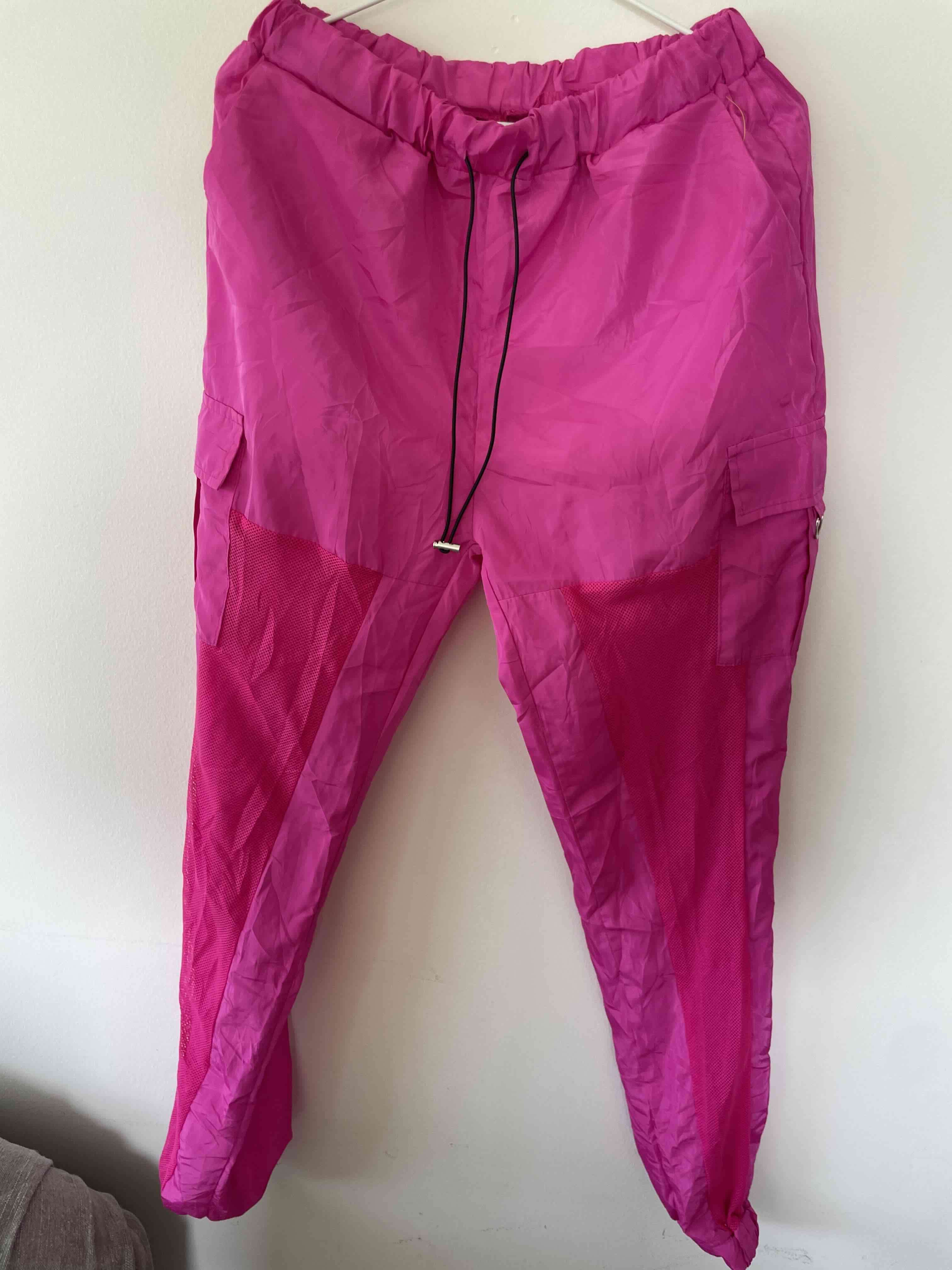 Pantalones deportivos fucsia