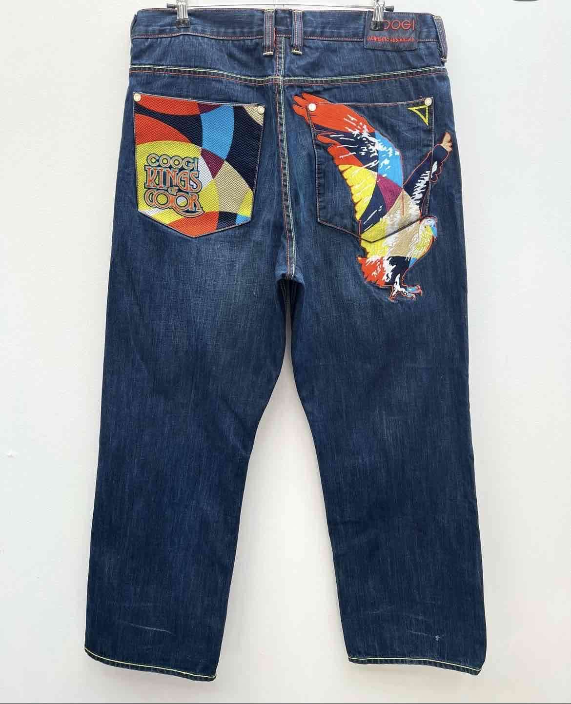 Jeans azul con diseño de pájaro