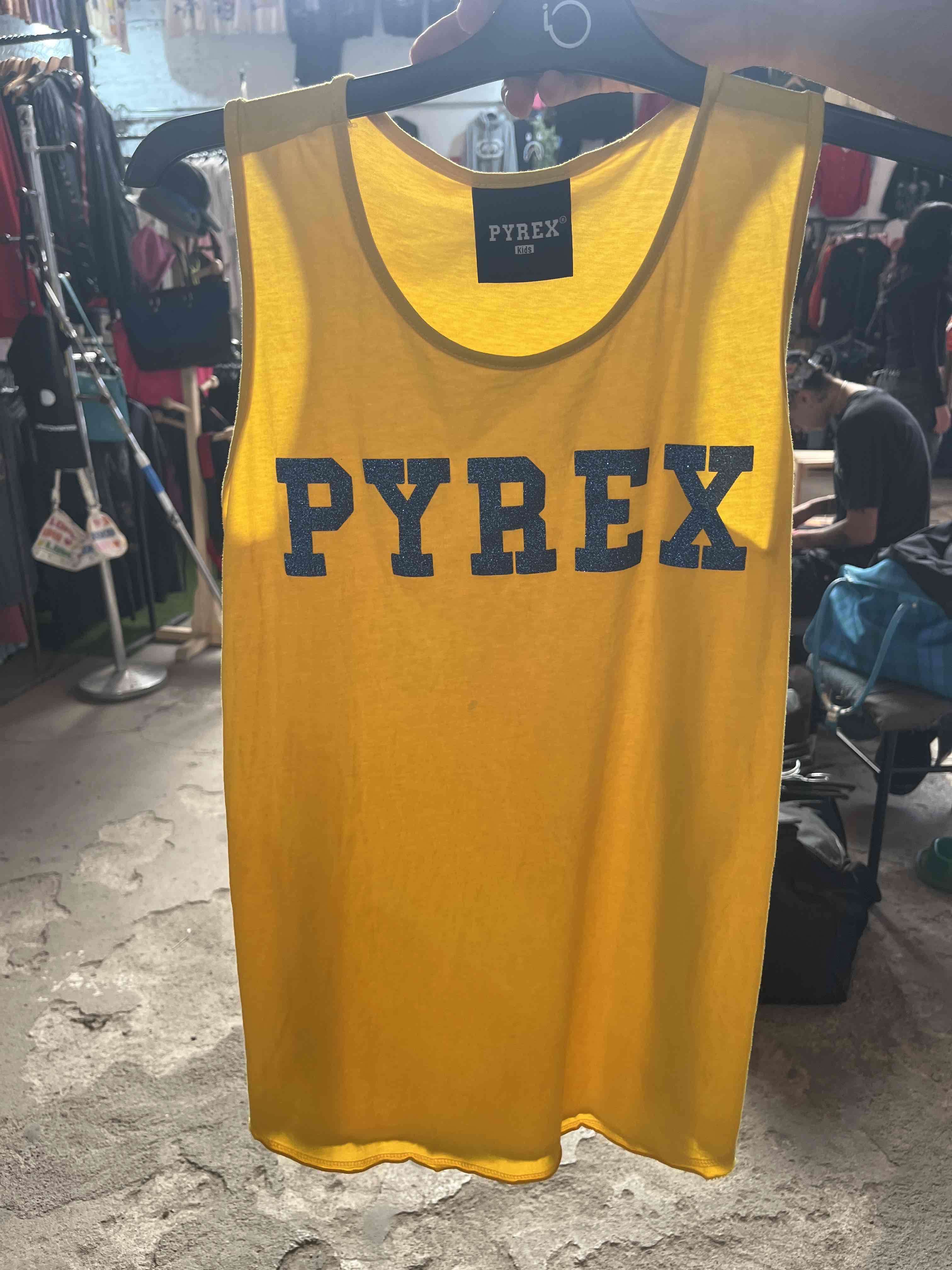 Polera sin mangas amarilla Pyrex