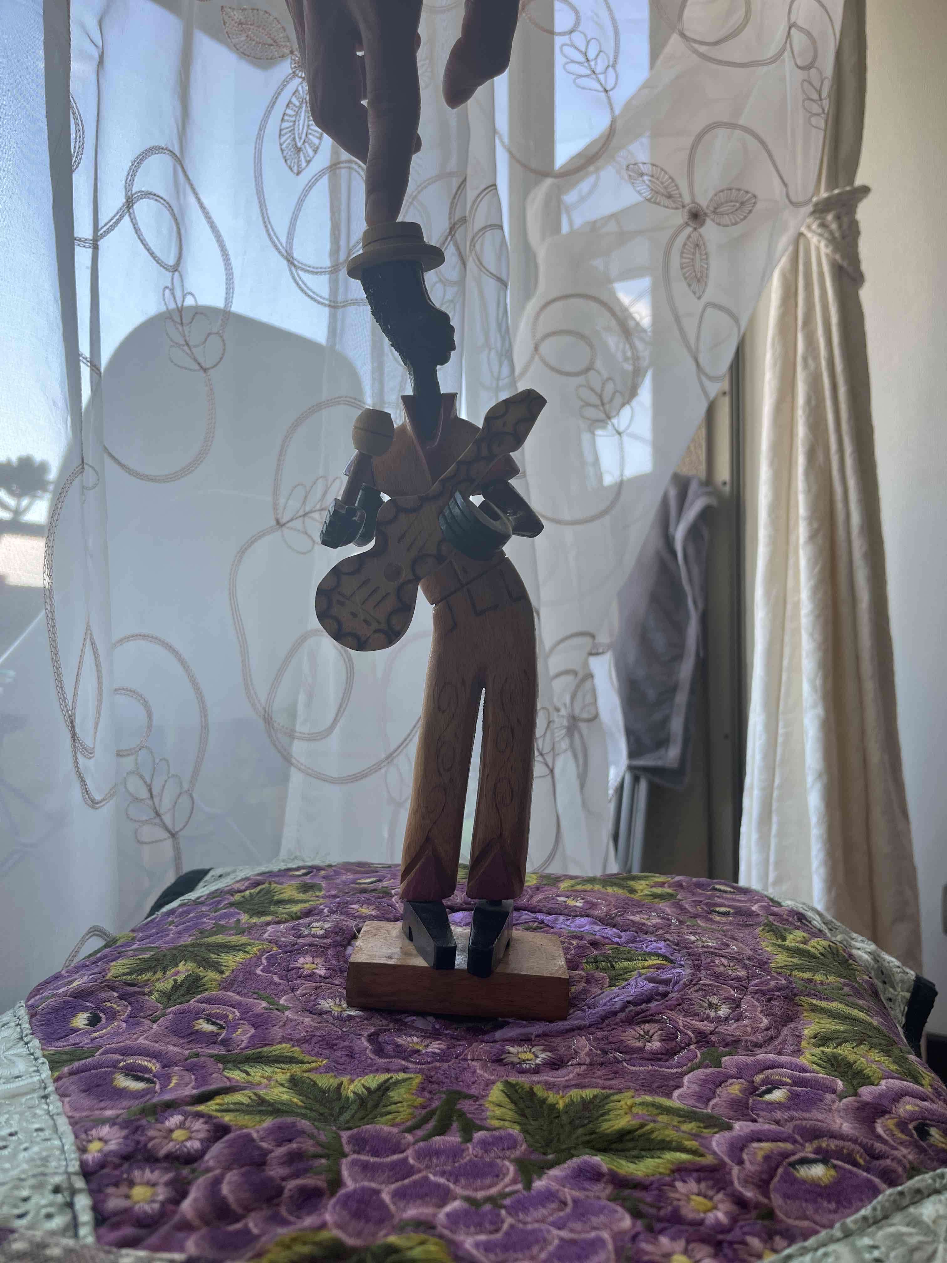 Figura decorativa de músico