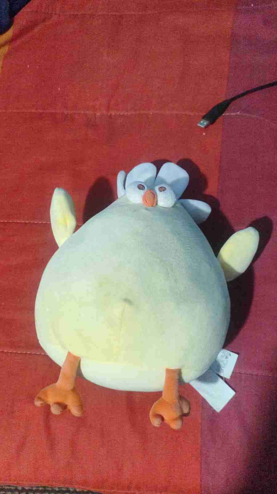 Peluche de pollo amarillo