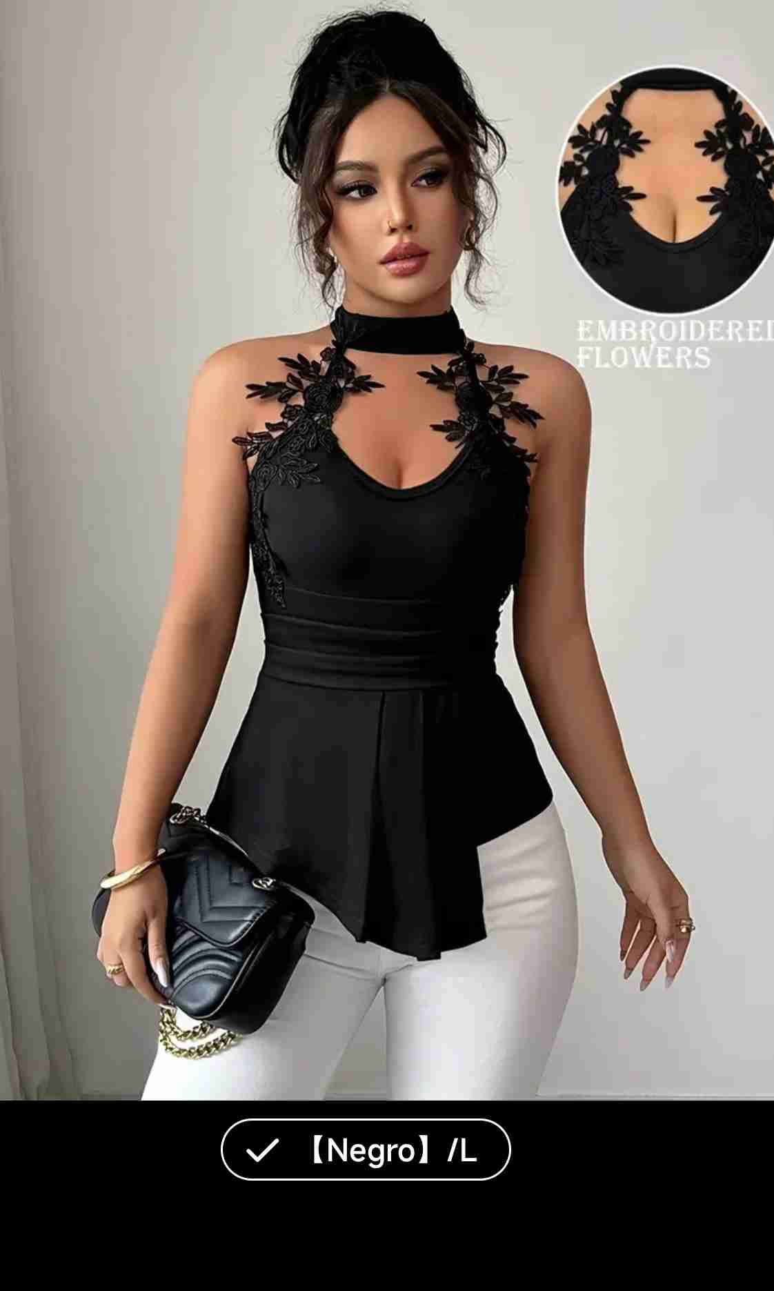 Blusa negra con encaje floral