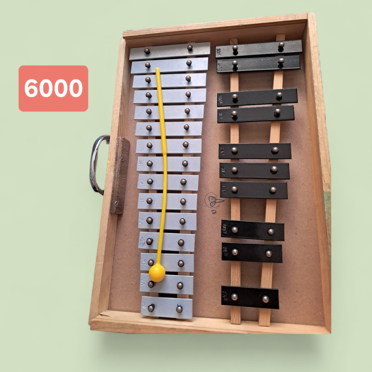 Xilófono de madera con baqueta