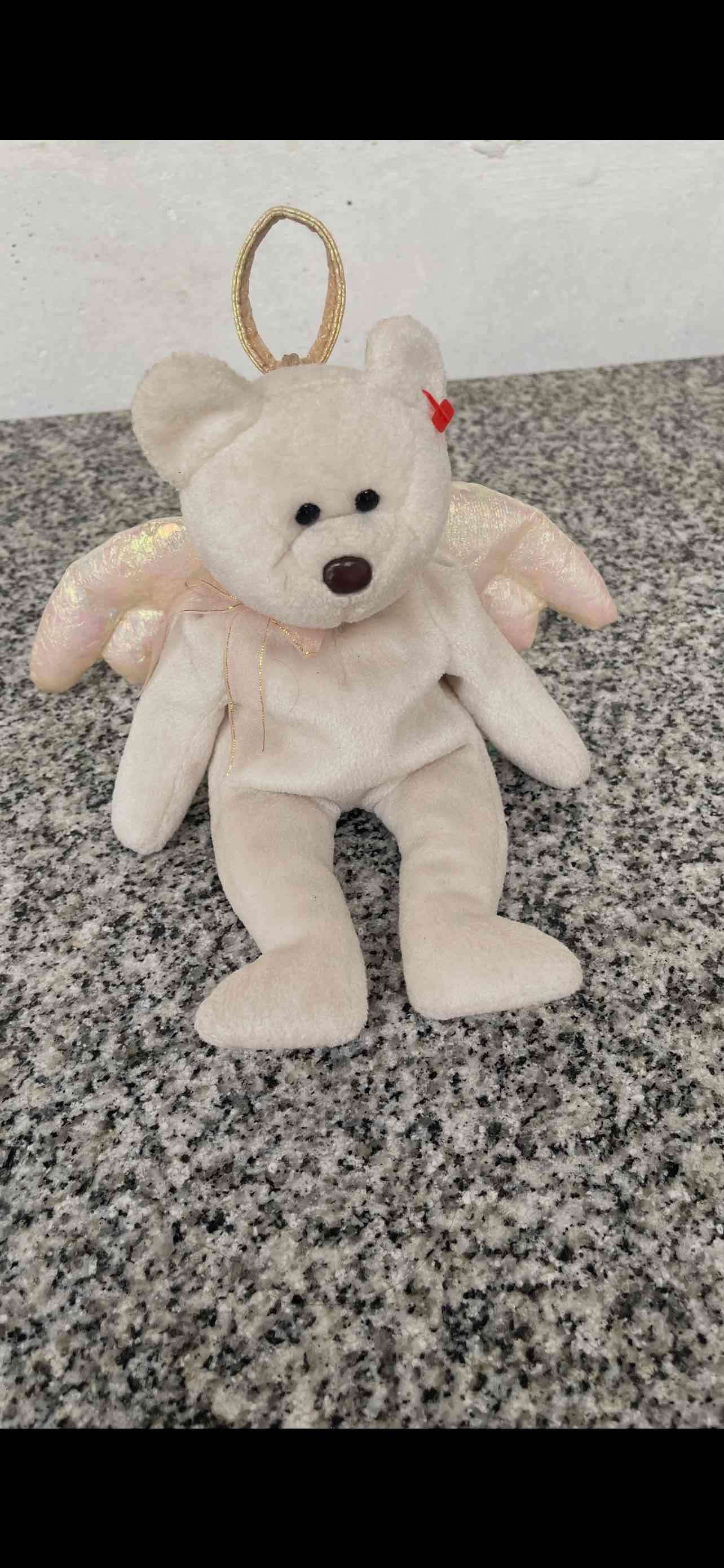 Osito de peluche angelical beige