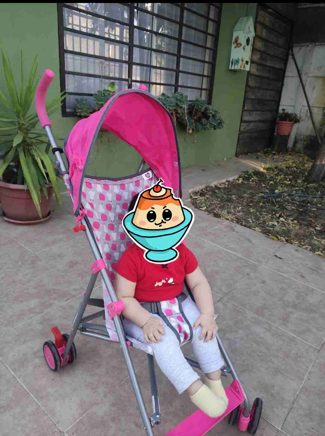 Coche paraguas rosa para bebé