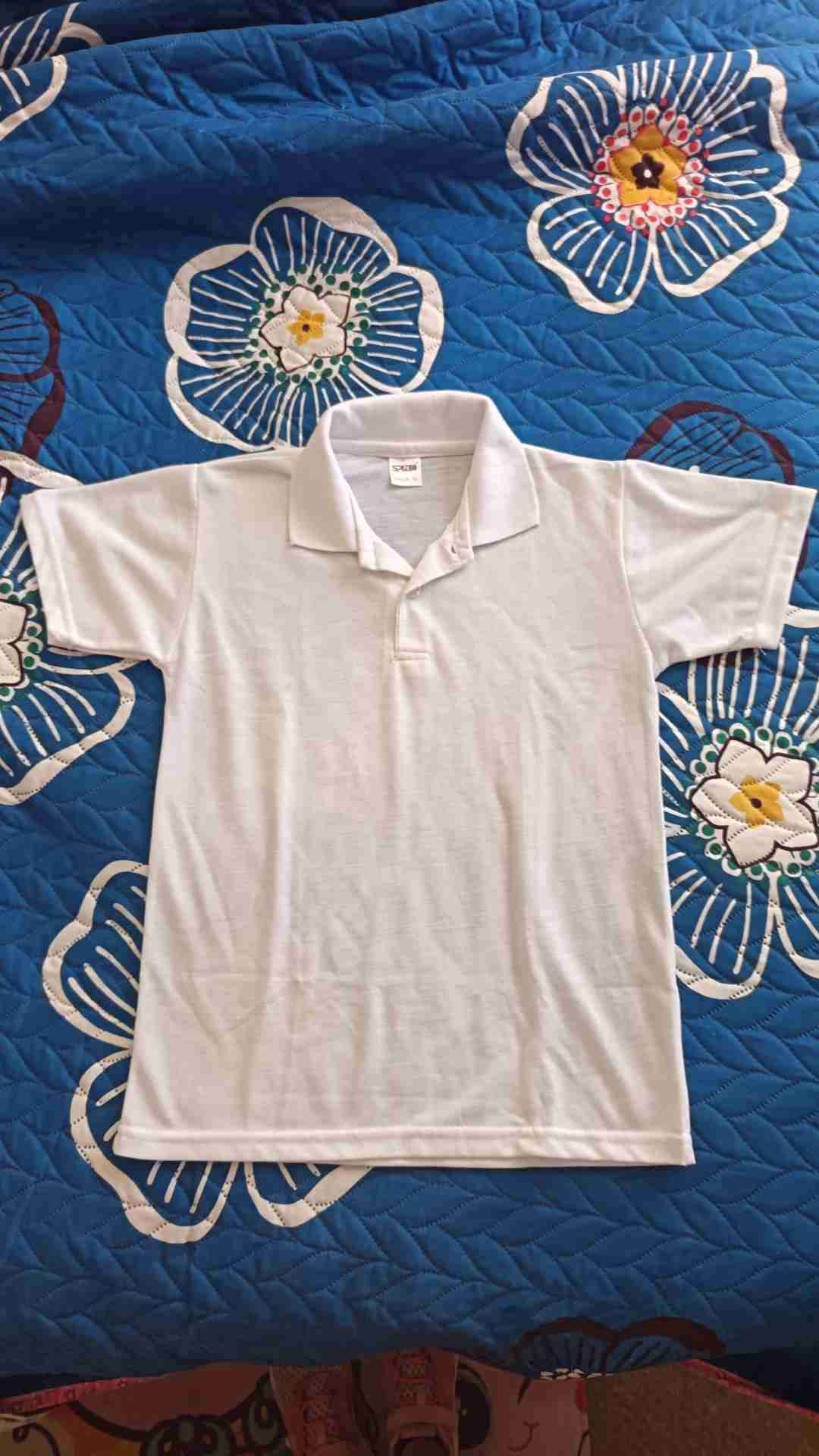 Polera pique blanca