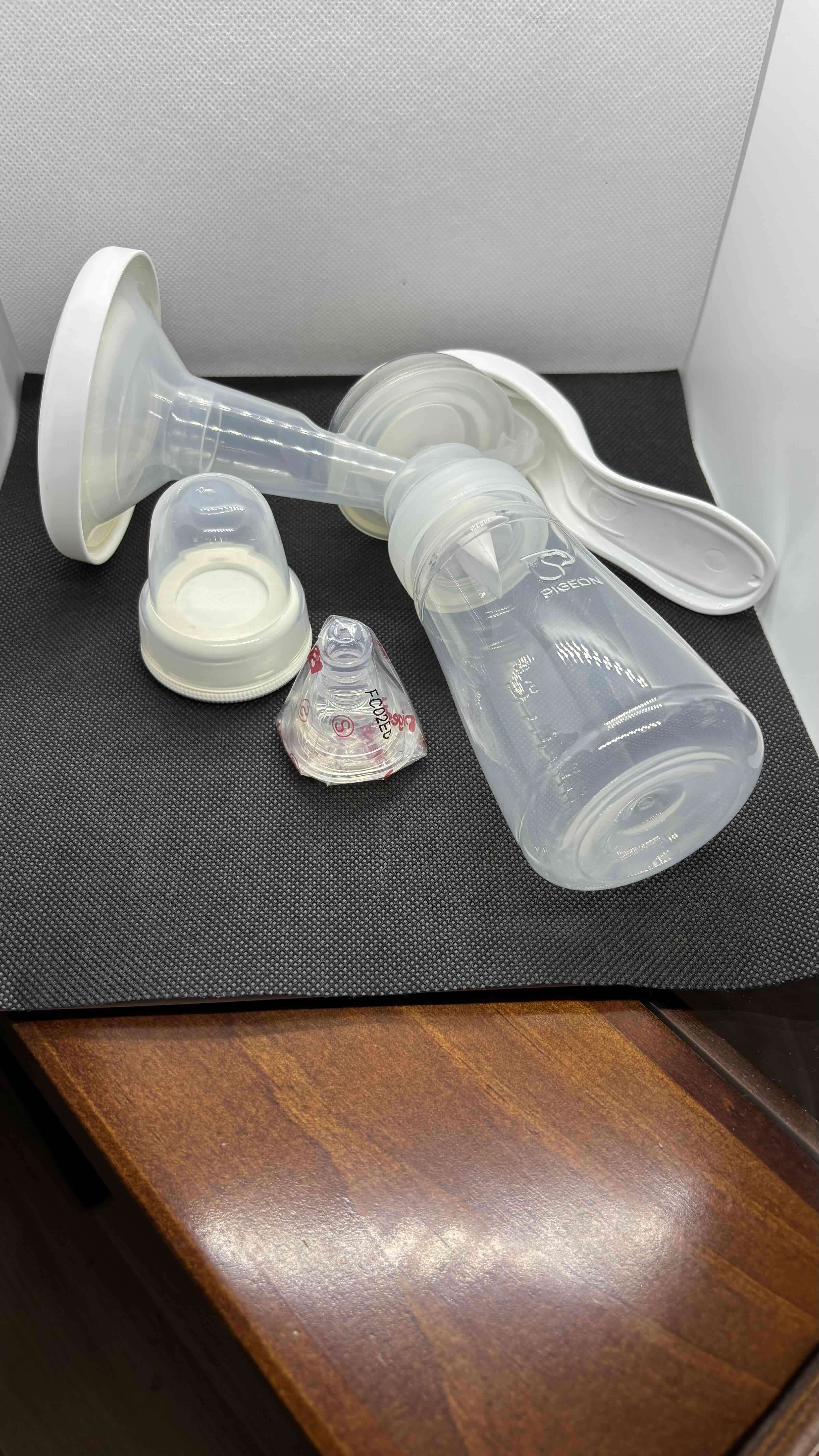 Extractor de leche manual transparente