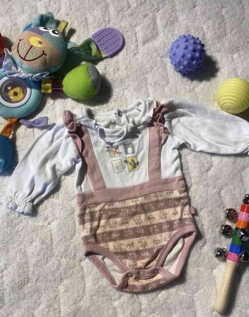Body para bebé rosa y blanco