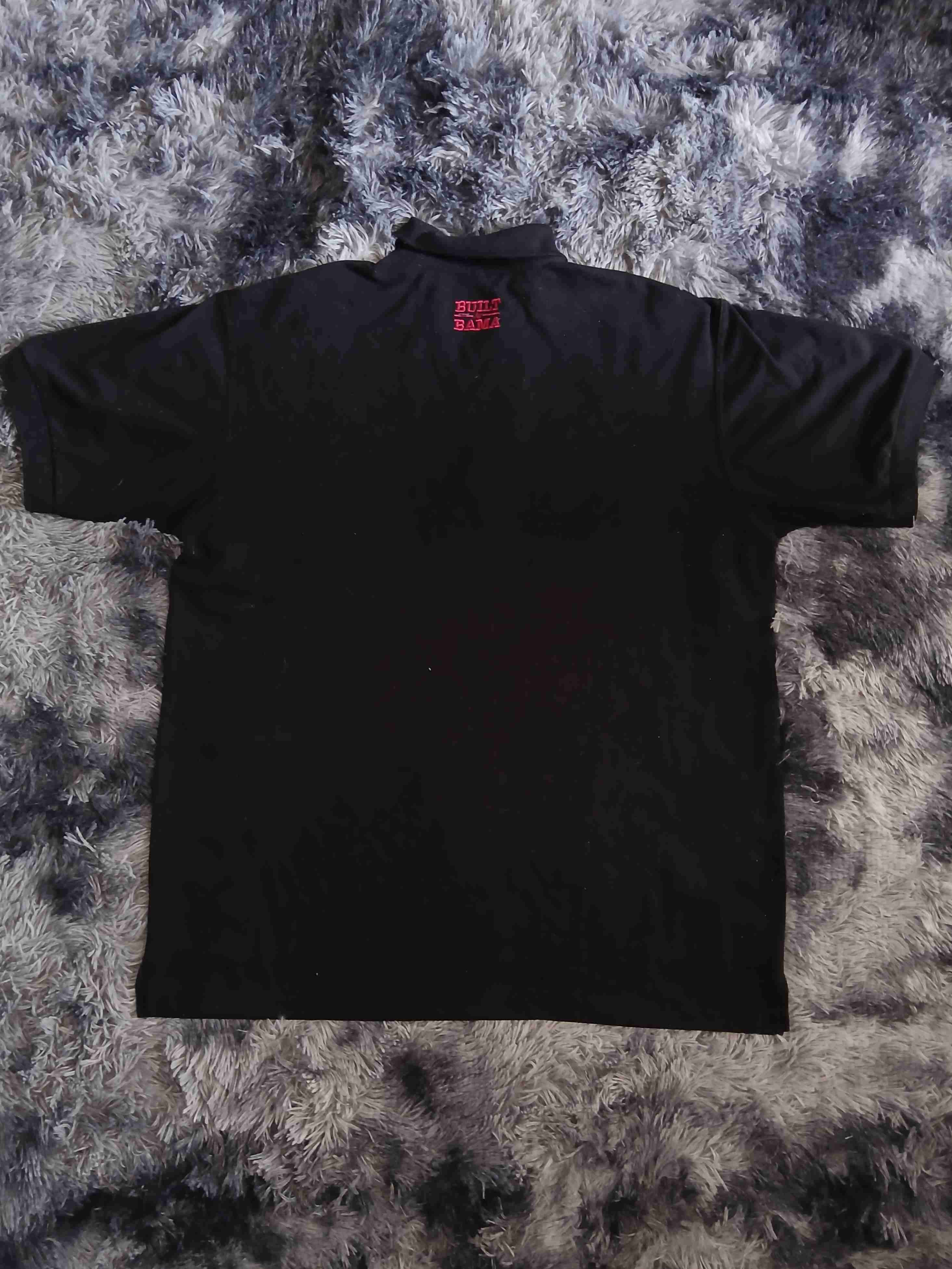Polera negra polo con logo de elefante - miniatura 2