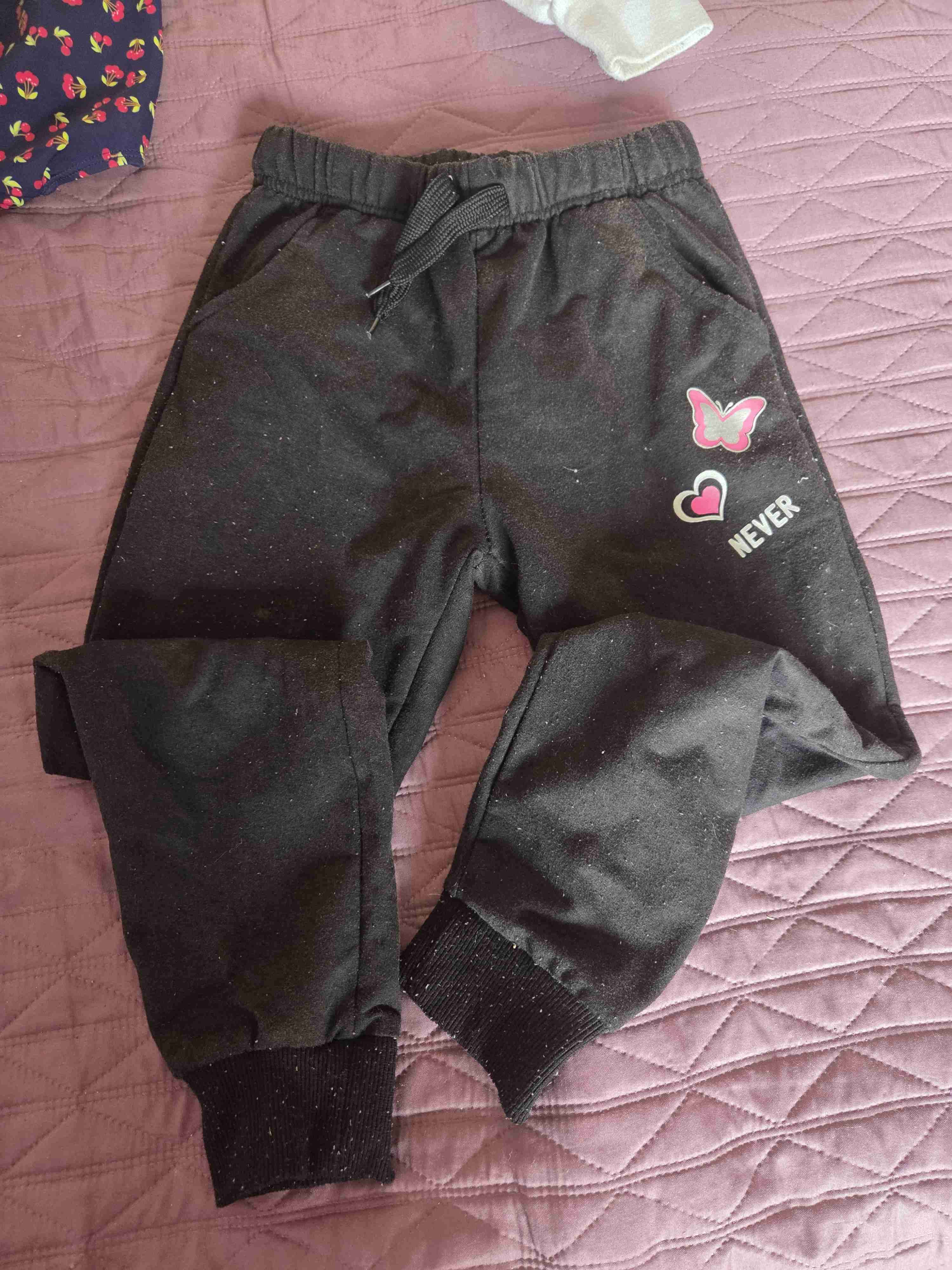 Pantalones deportivos negros con diseño talla 8