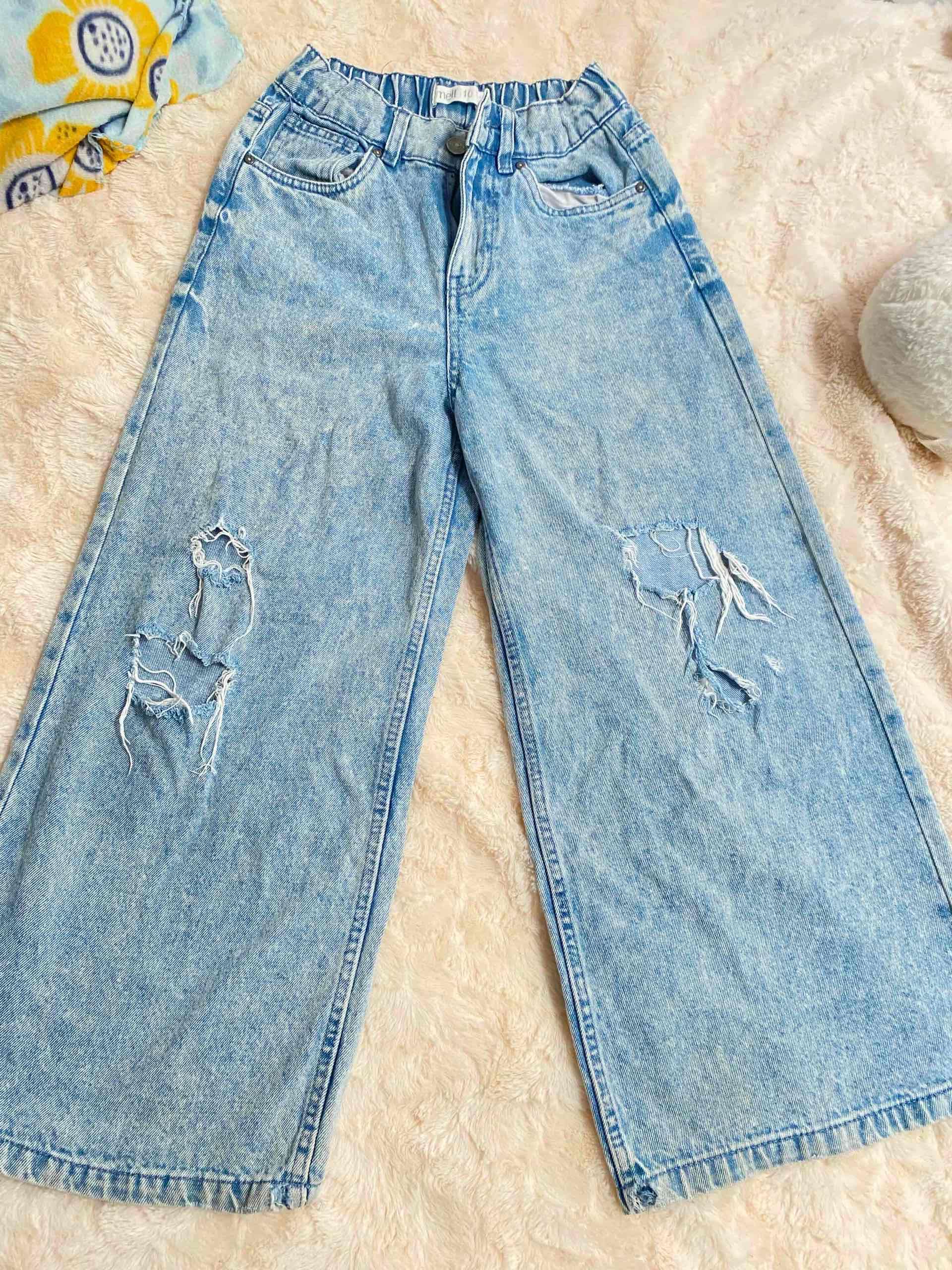 Jeans niña t/10 celestes desgastados marca Melt