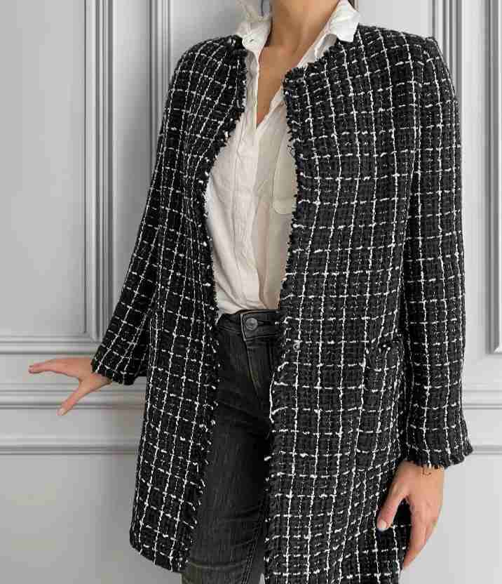 Abrigo tweed blanco y negro Mango