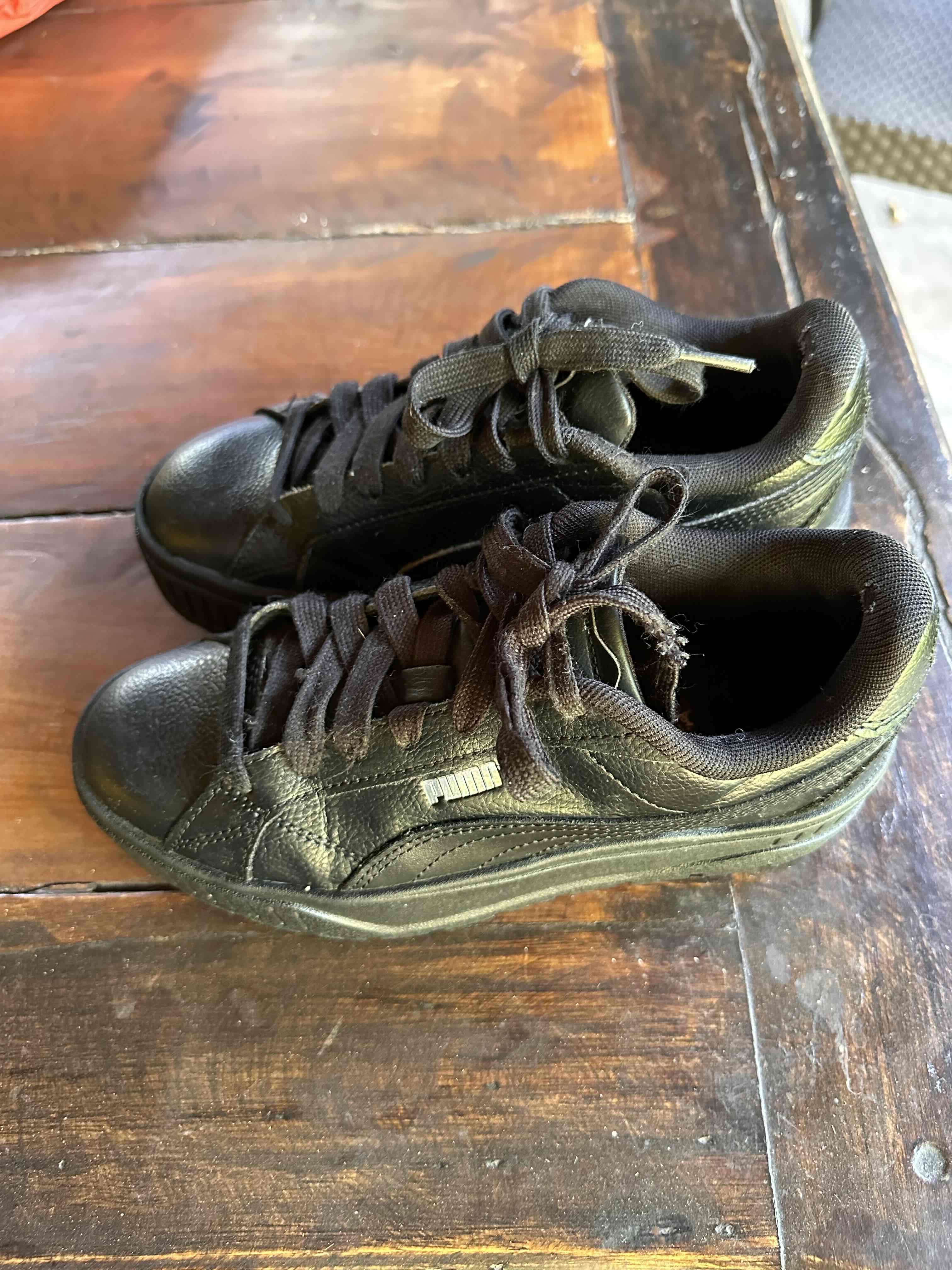 Zapatillas negras Puma en buen estado