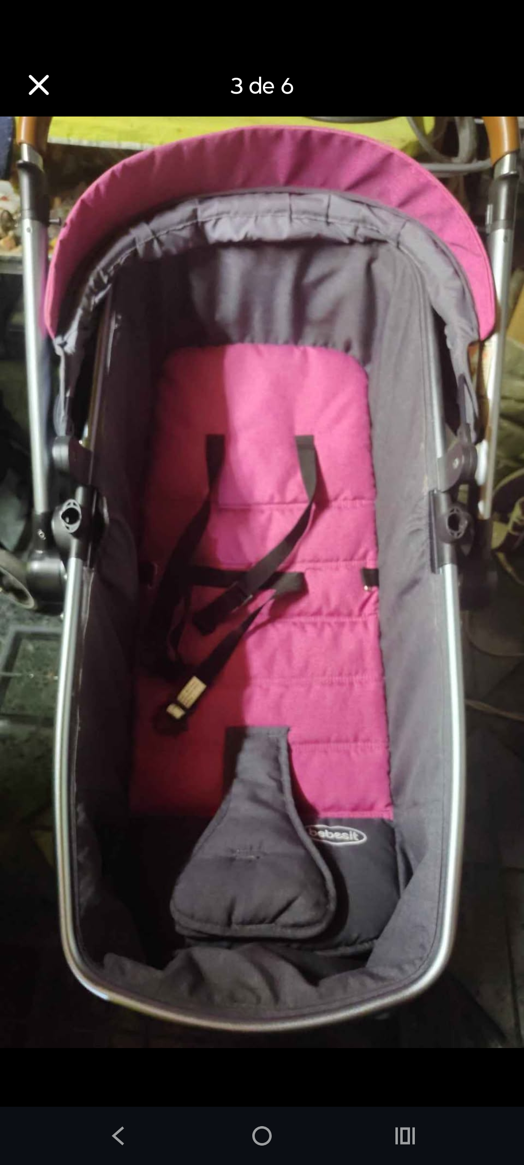 Coche para bebé fucsia y negro