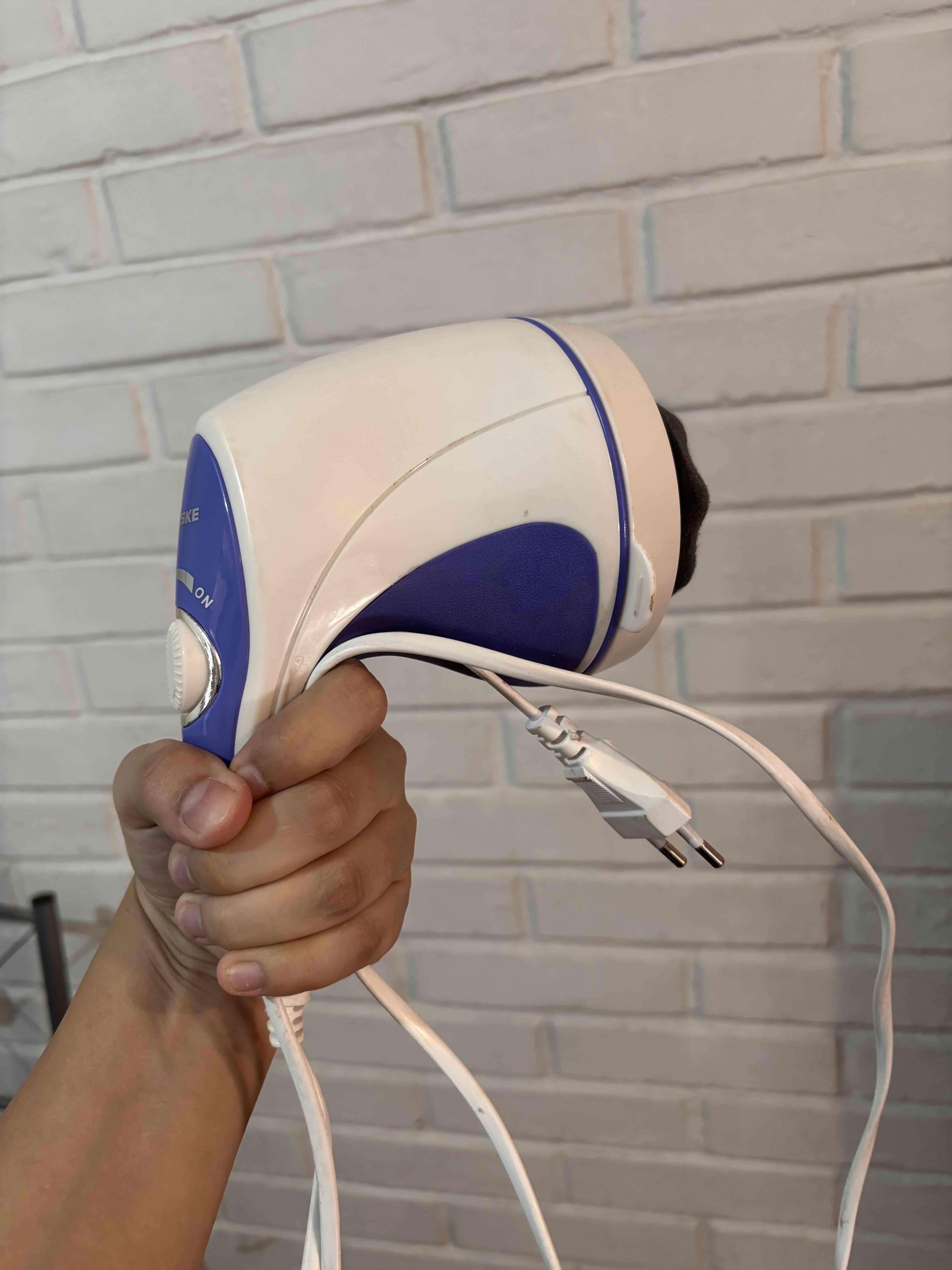 Masajeador eléctrico de mano