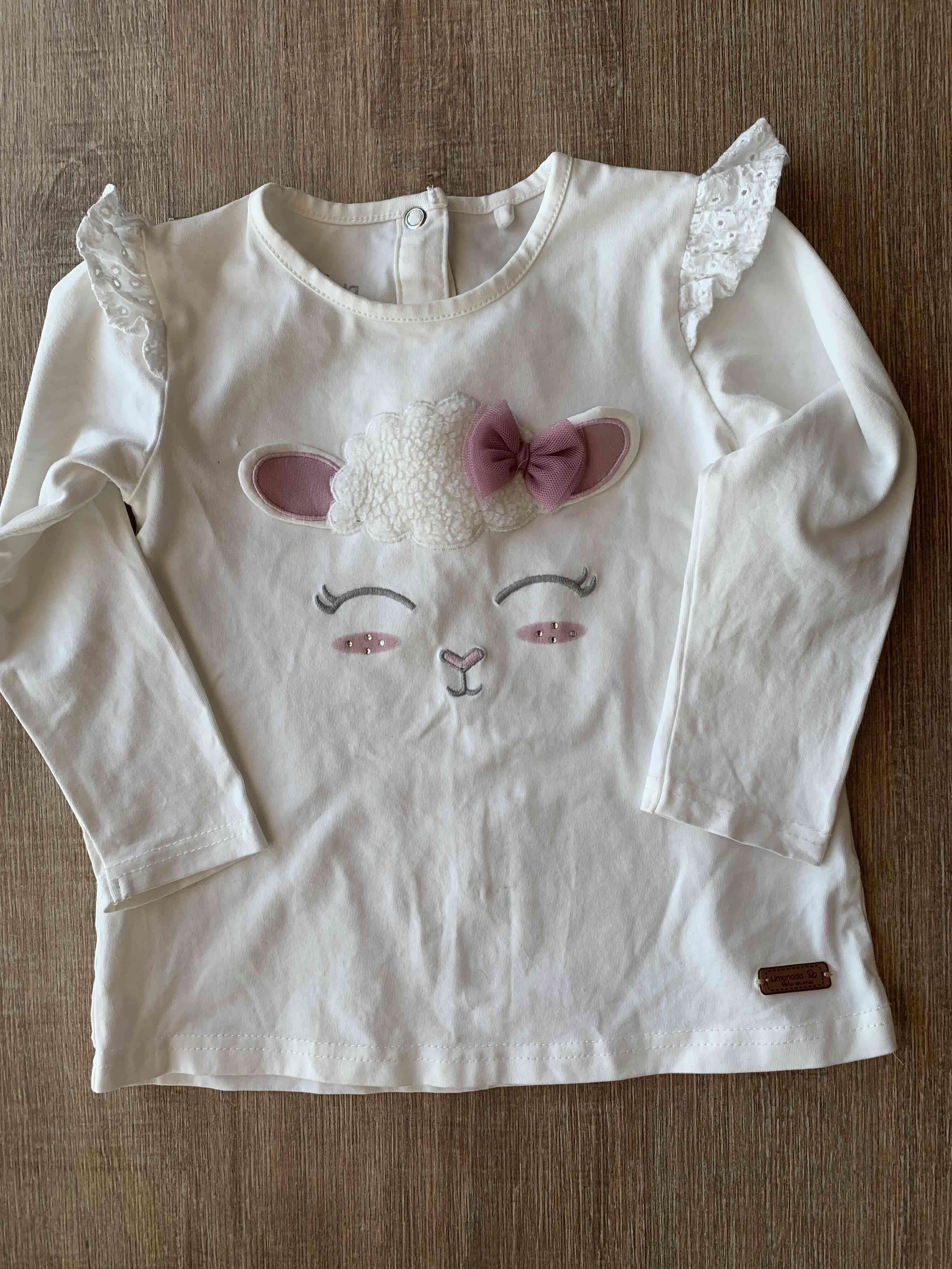 Polera infantil blanca con bordado. Limonada