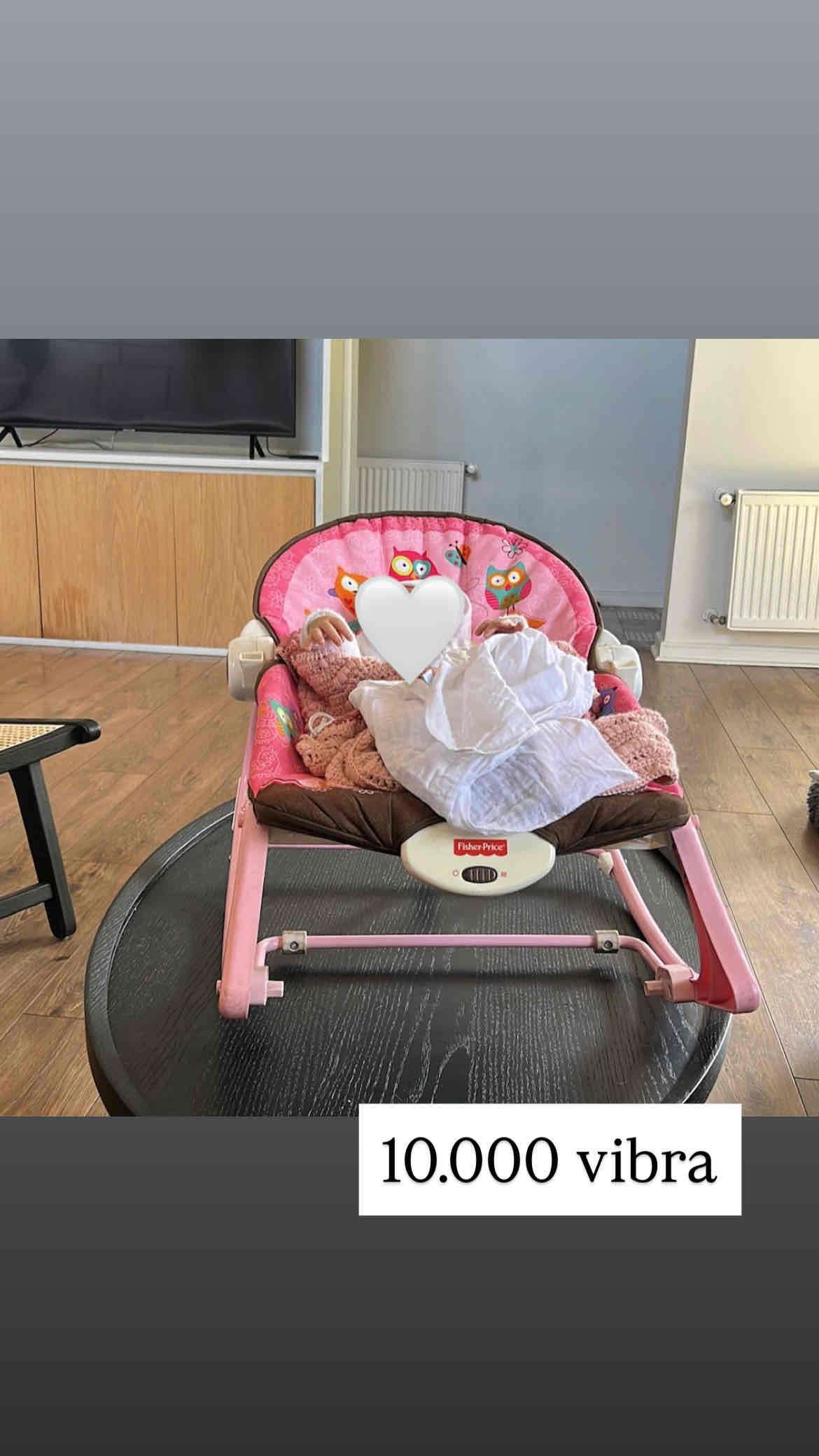 Silla vibradora rosa para bebé