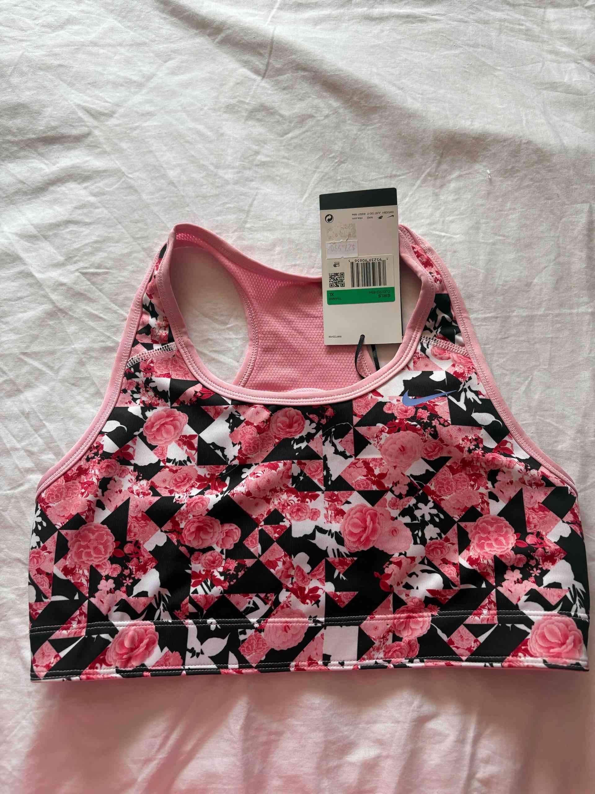 Top deportivo floral rosa