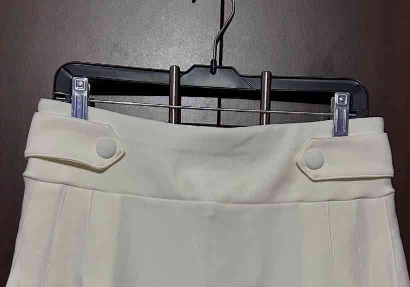 Falda blanca plisada - miniatura 2