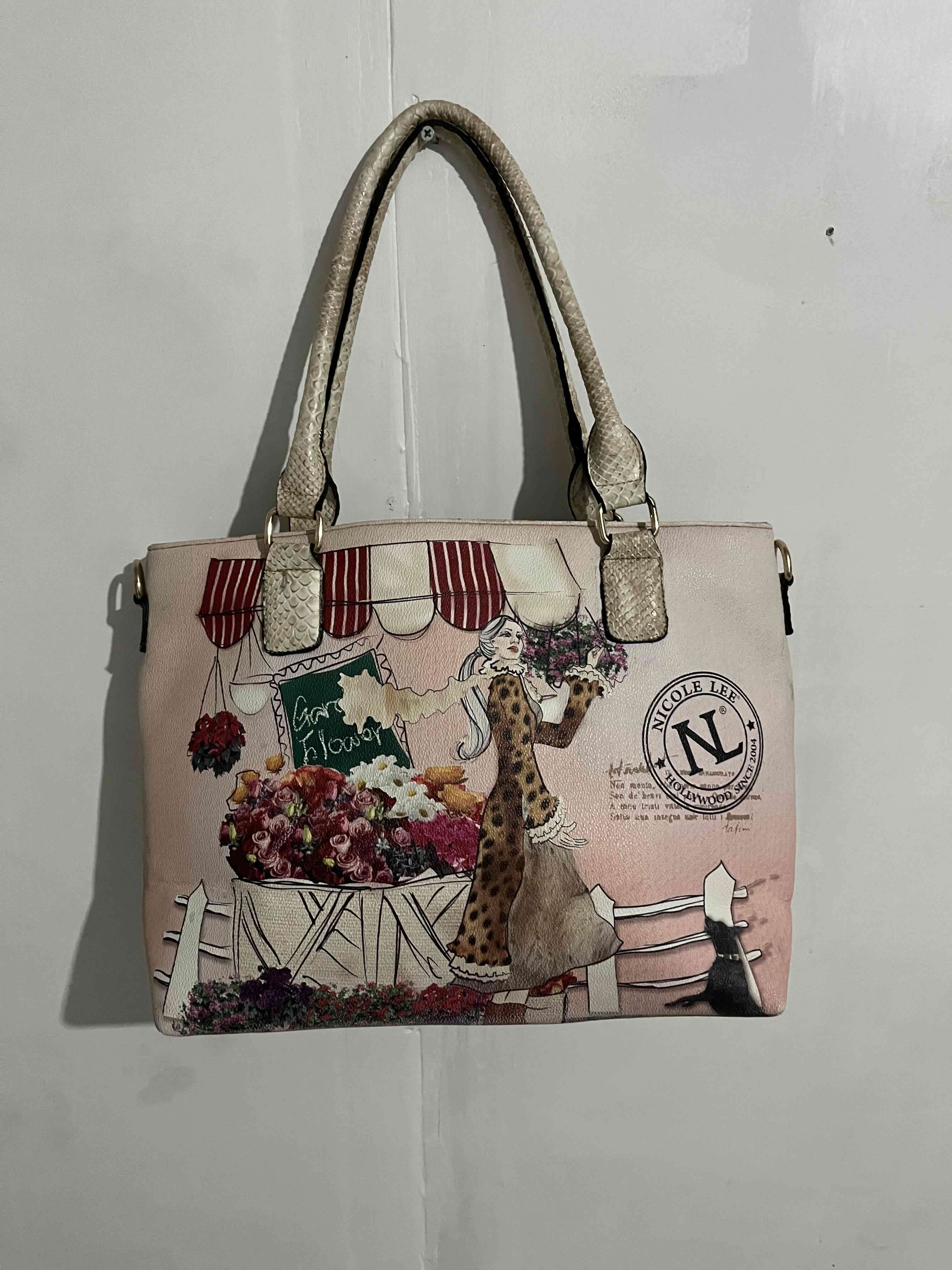 Cartera Nicole Lee diseño floral