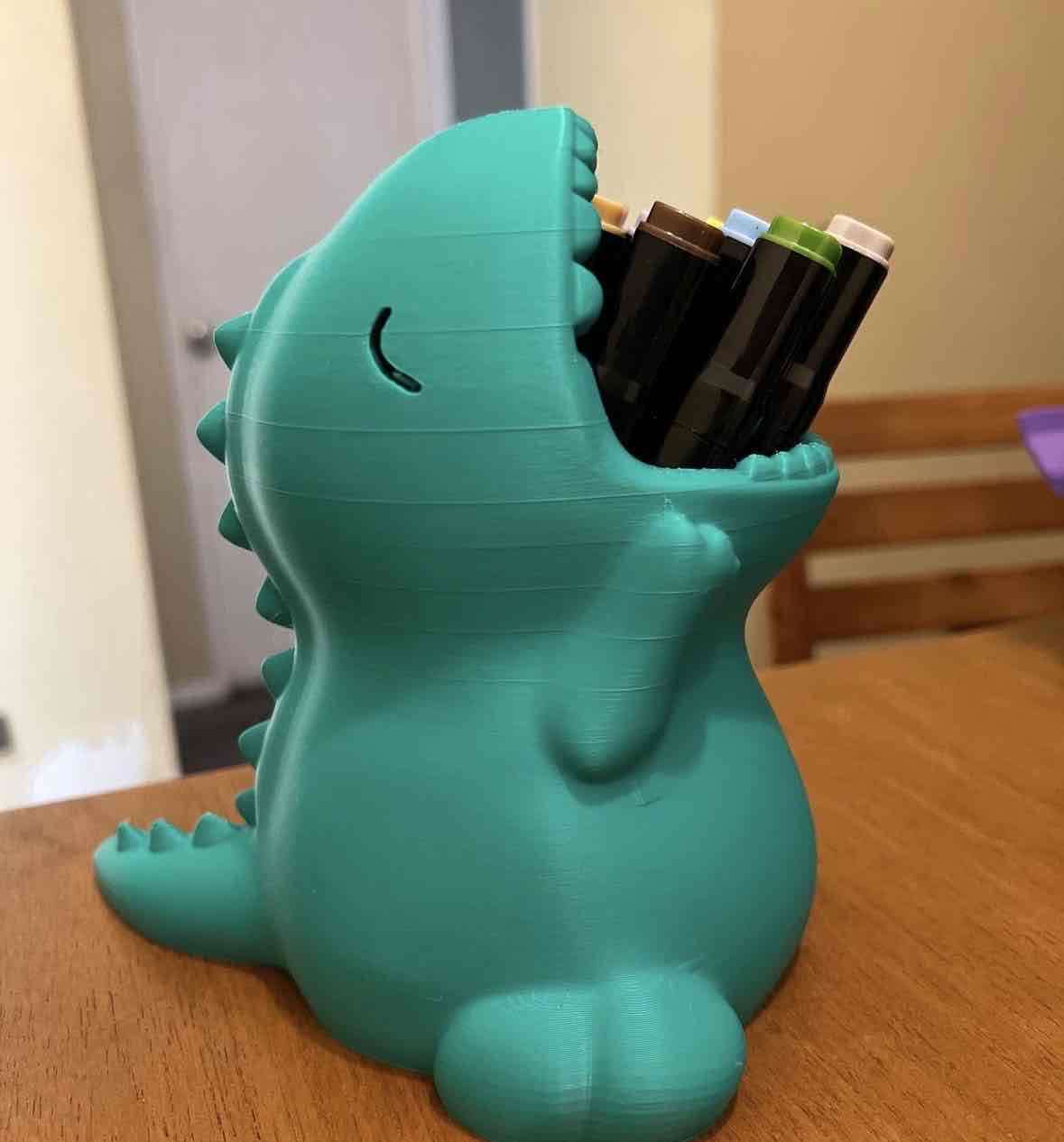 Portalápices de  dinosaurio