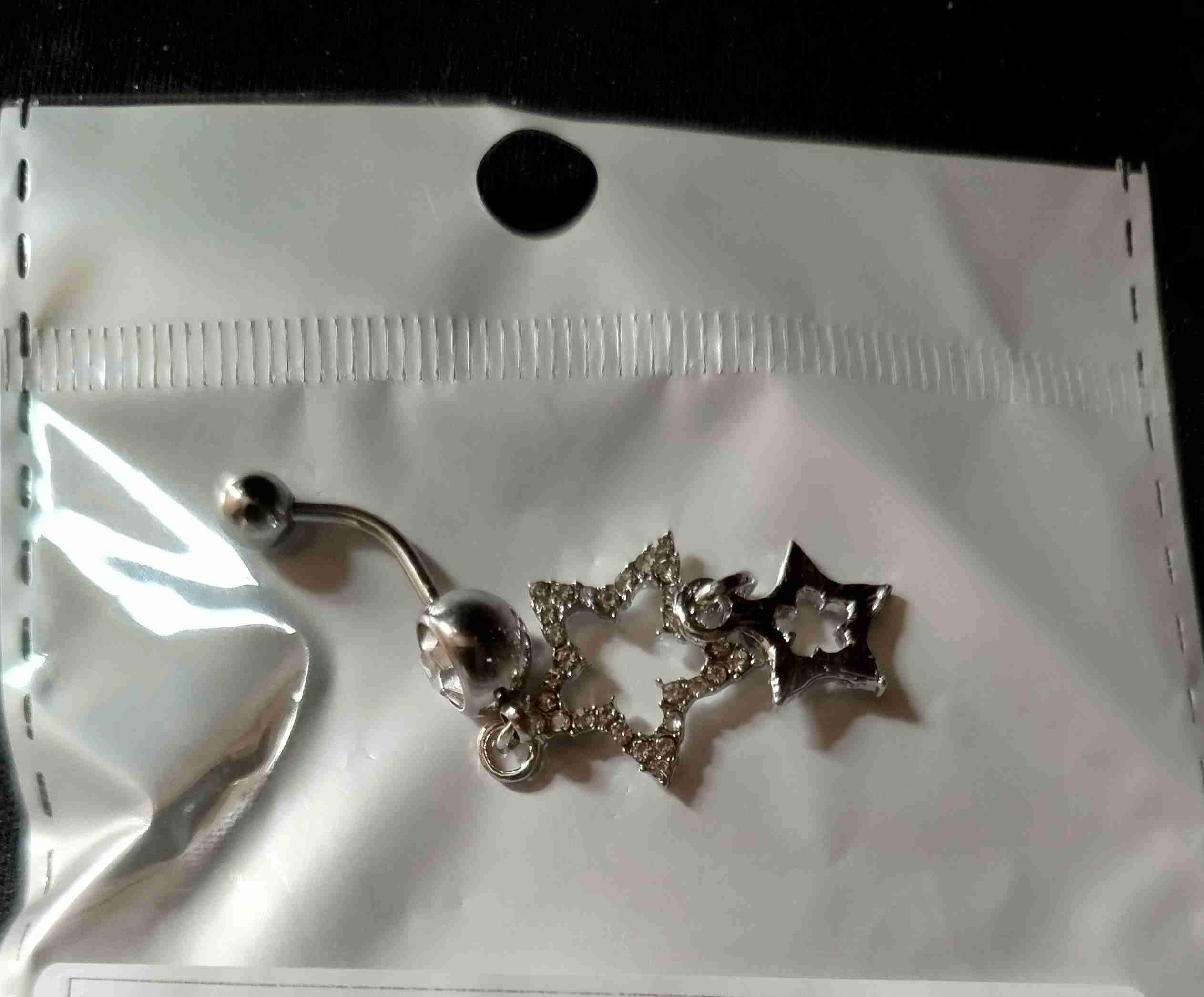 Piercing de ombligo estrella plateado