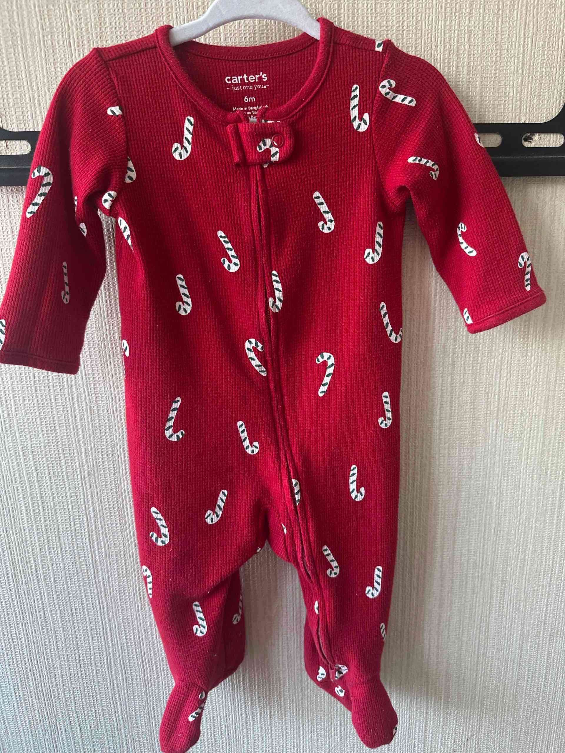 Enterito bebé rojo con bastones