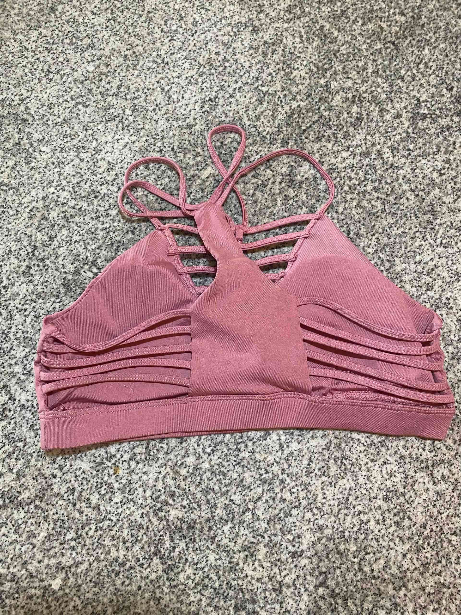 Top deportivo rosado con tiras - miniatura 2