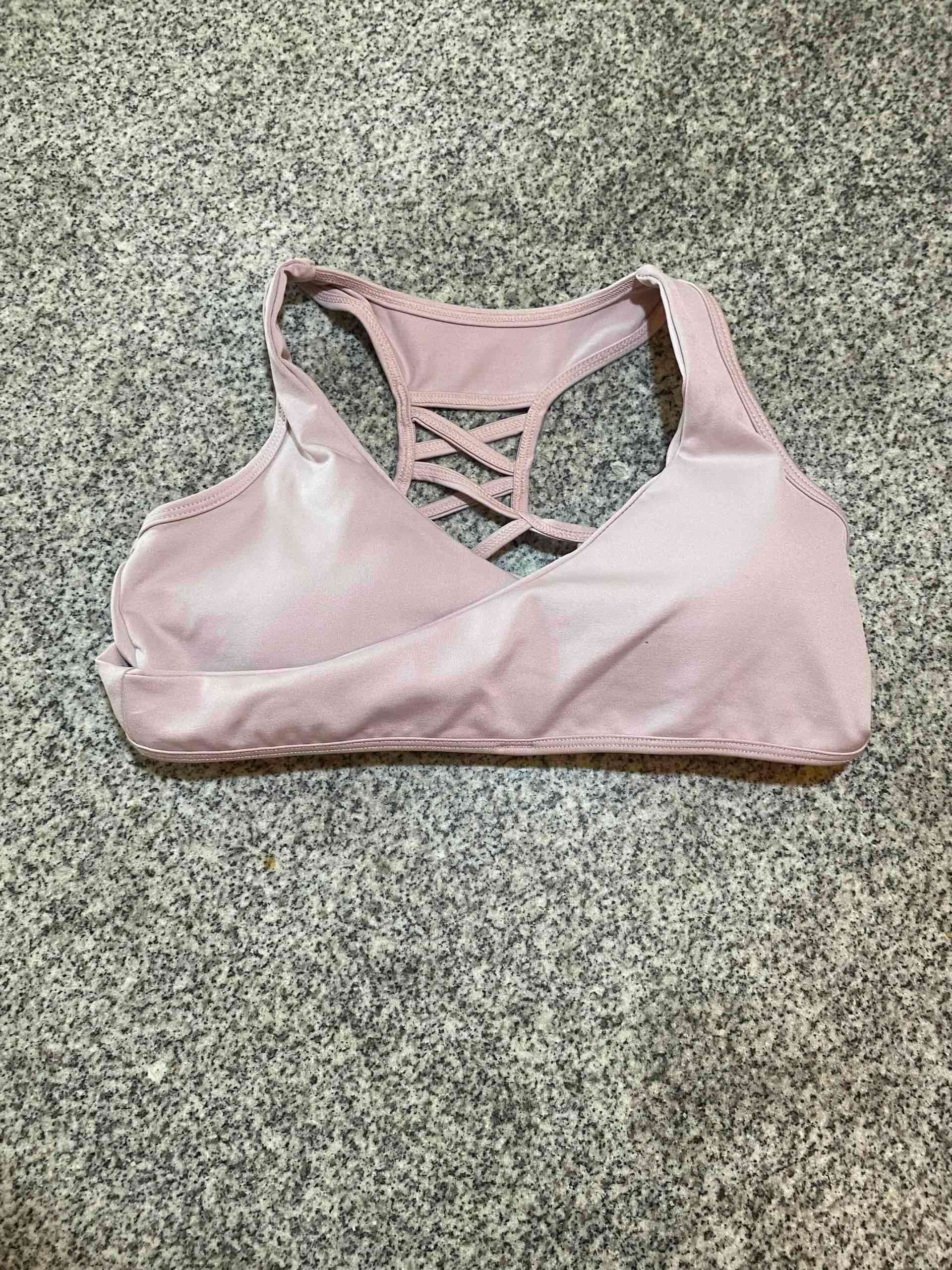 Top deportivo rosa claro