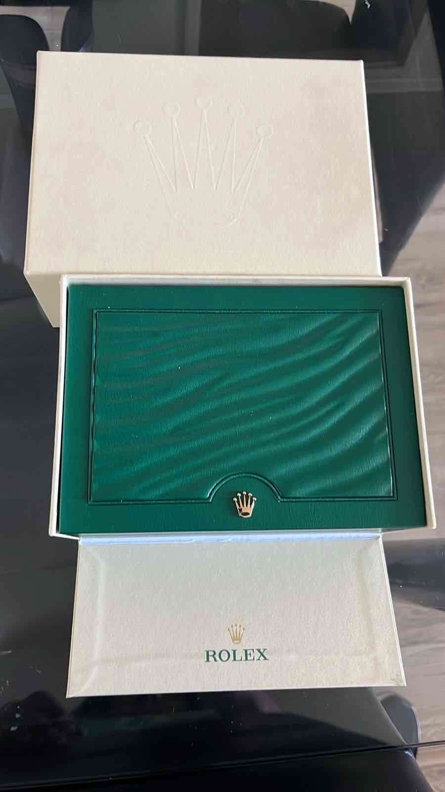 Caja de reloj Rolex con reloj