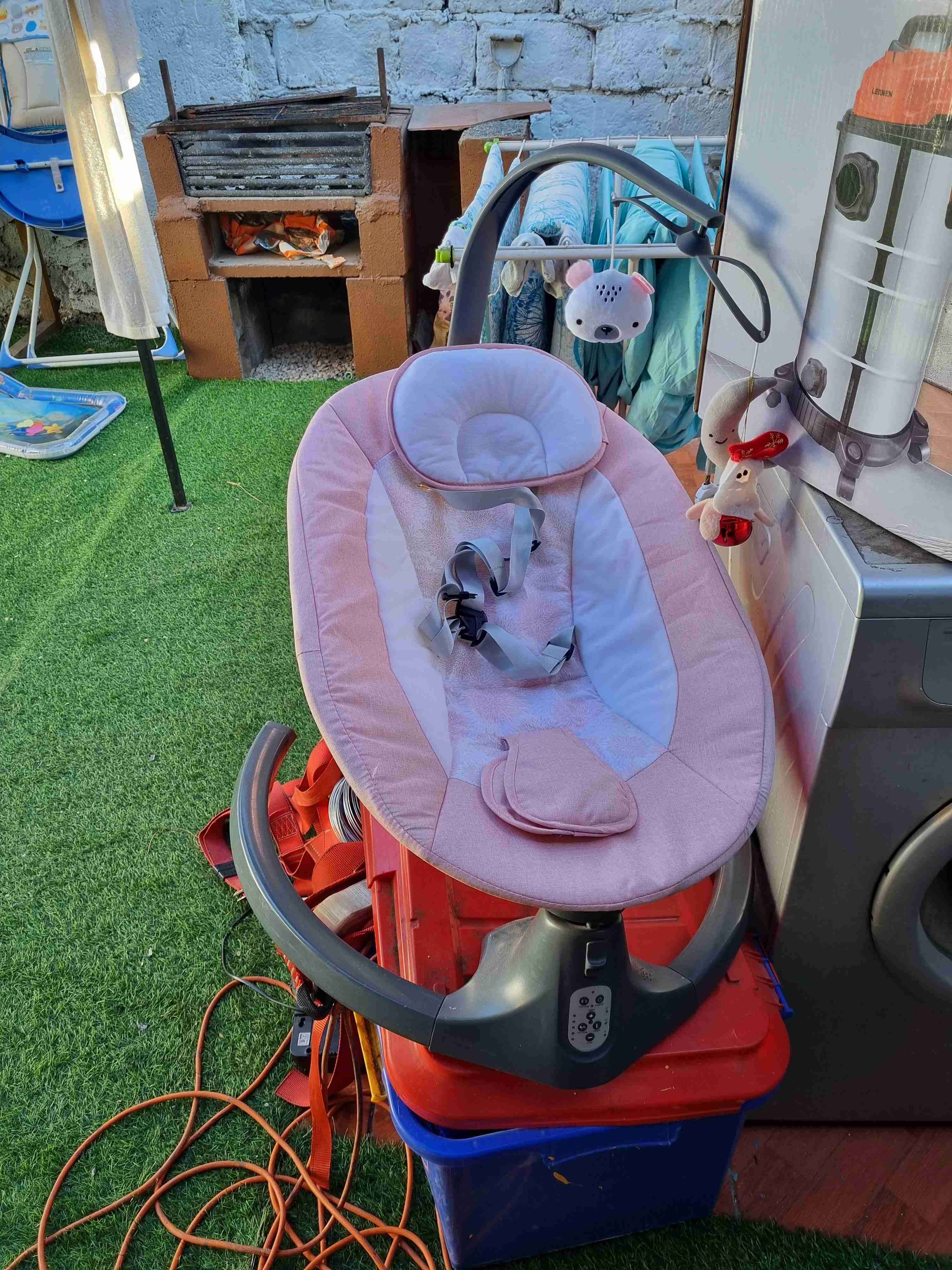 Columpio de bebé rosa eléctrico