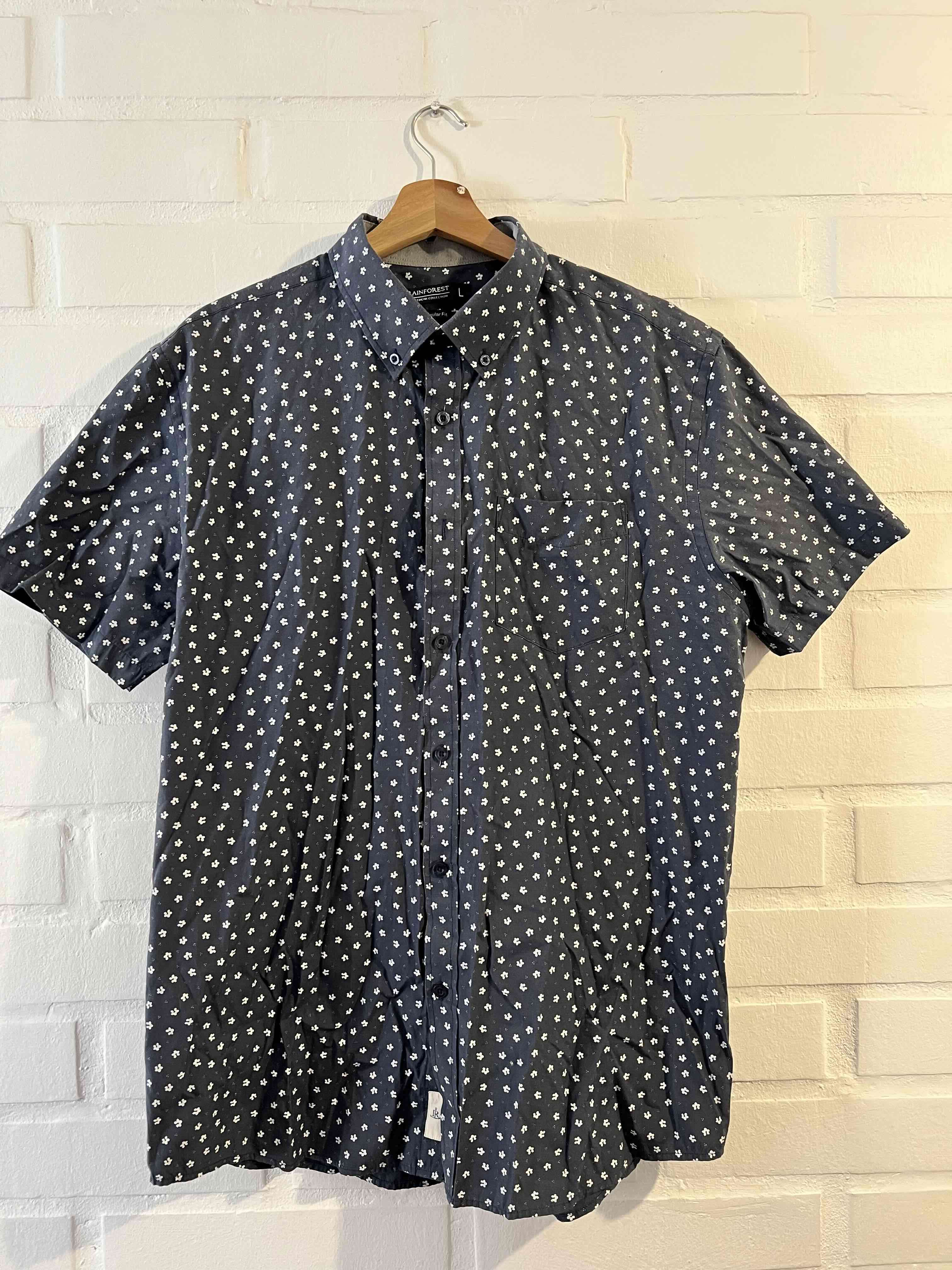 Camisa azul con estampado floral Rainforest