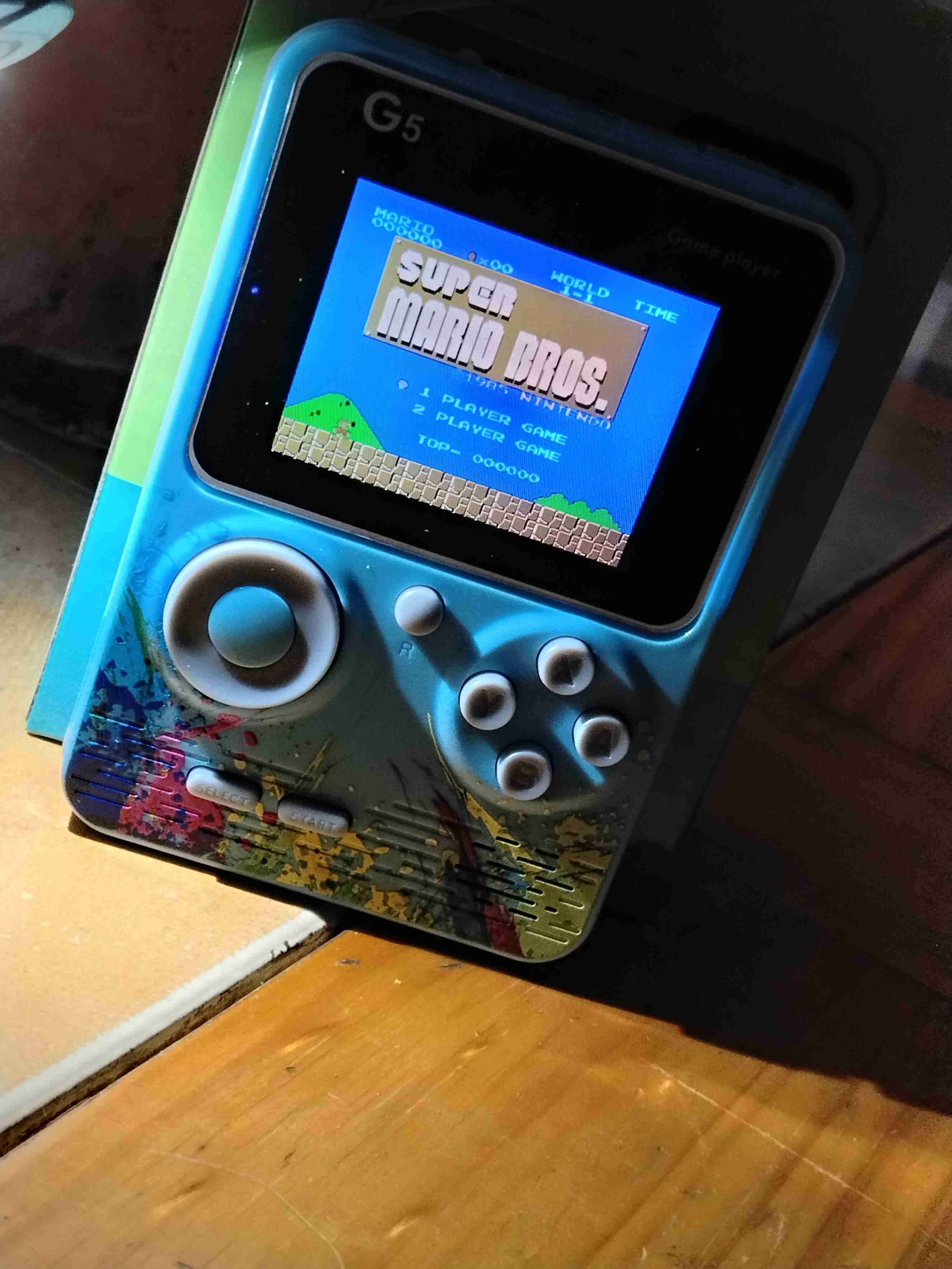 Consola portátil G5 retro con 500 juegos de NES - miniatura 2