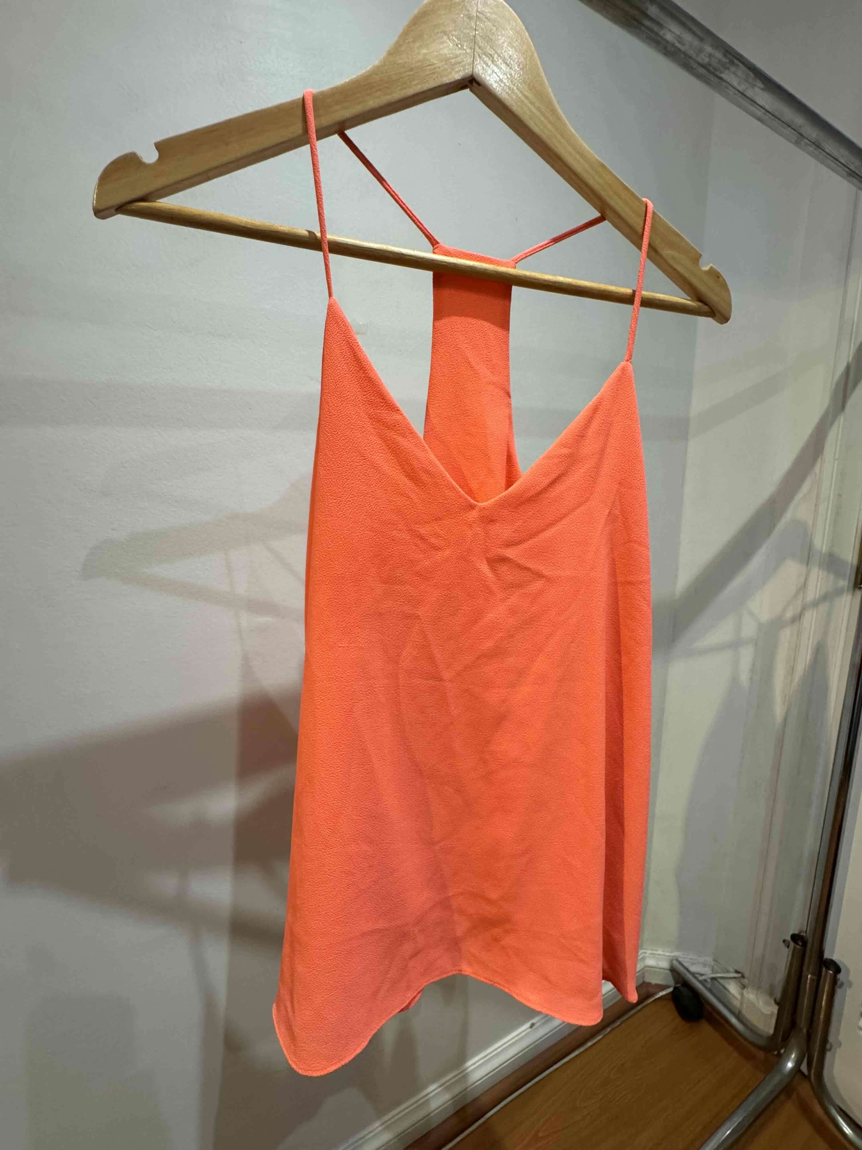 Polera sin mangas fluor