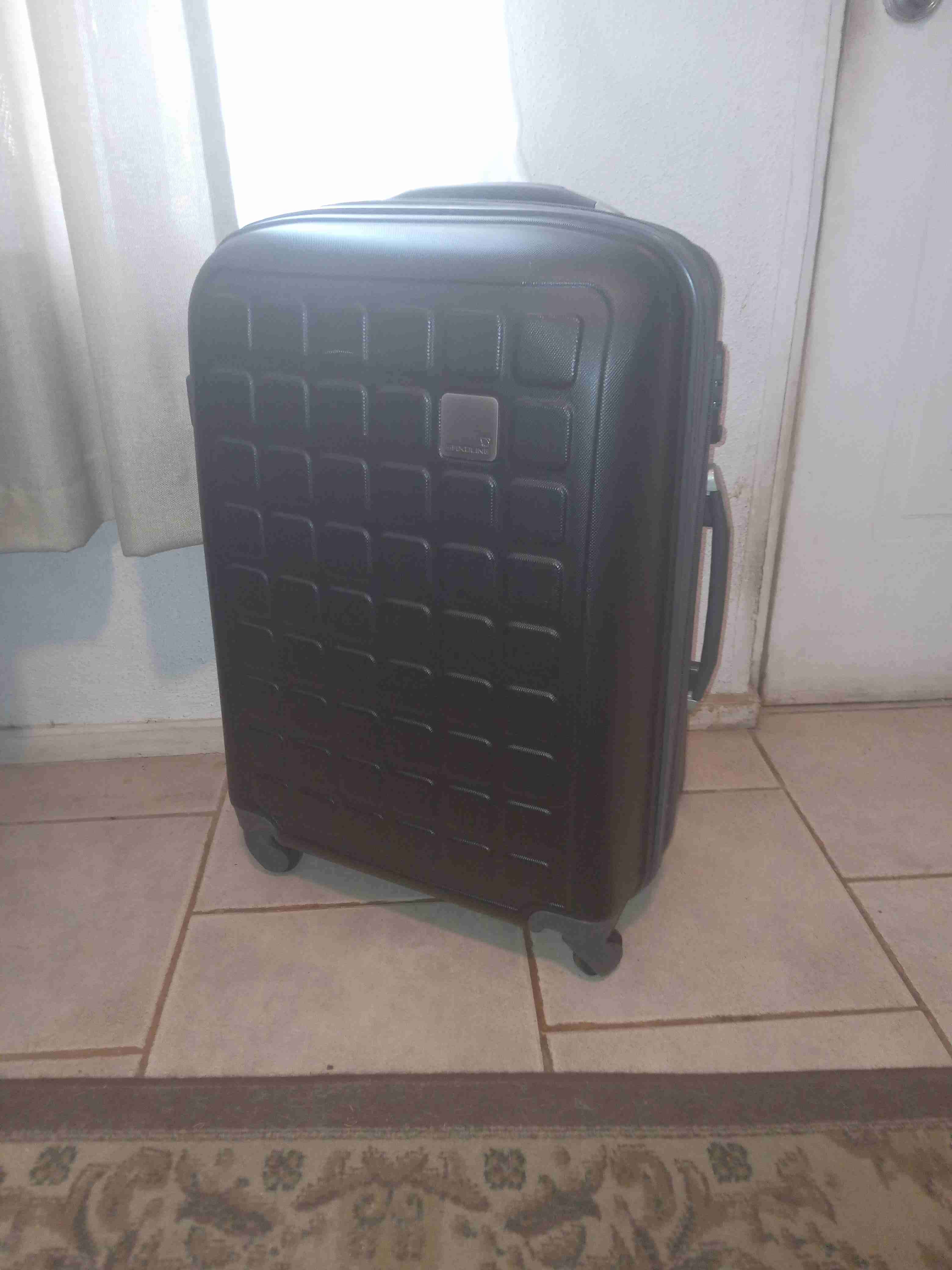 Maleta negra con ruedas - miniatura 4