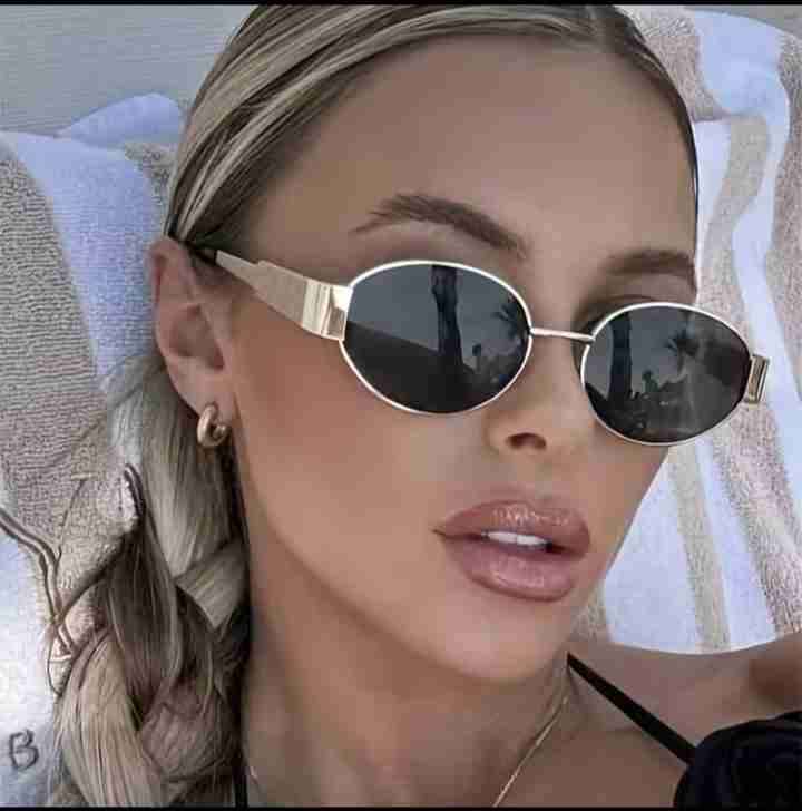 Lentes de sol ovalados dorados