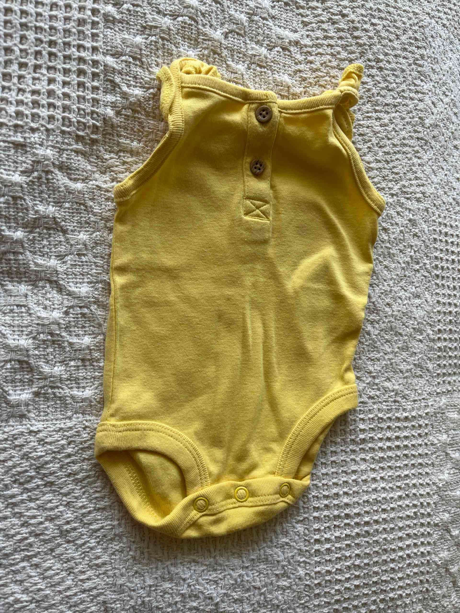 Body bebé amarillo NB