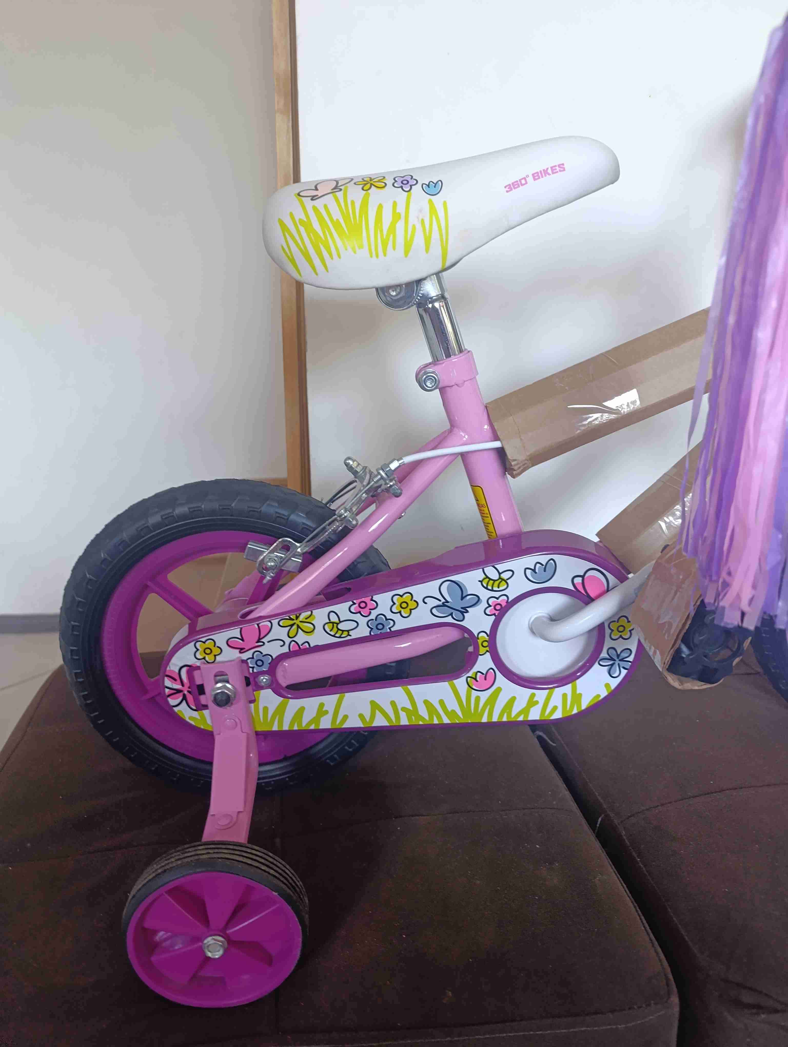 Bicicleta infantil rosa con rueditas aro 12 - miniatura 2