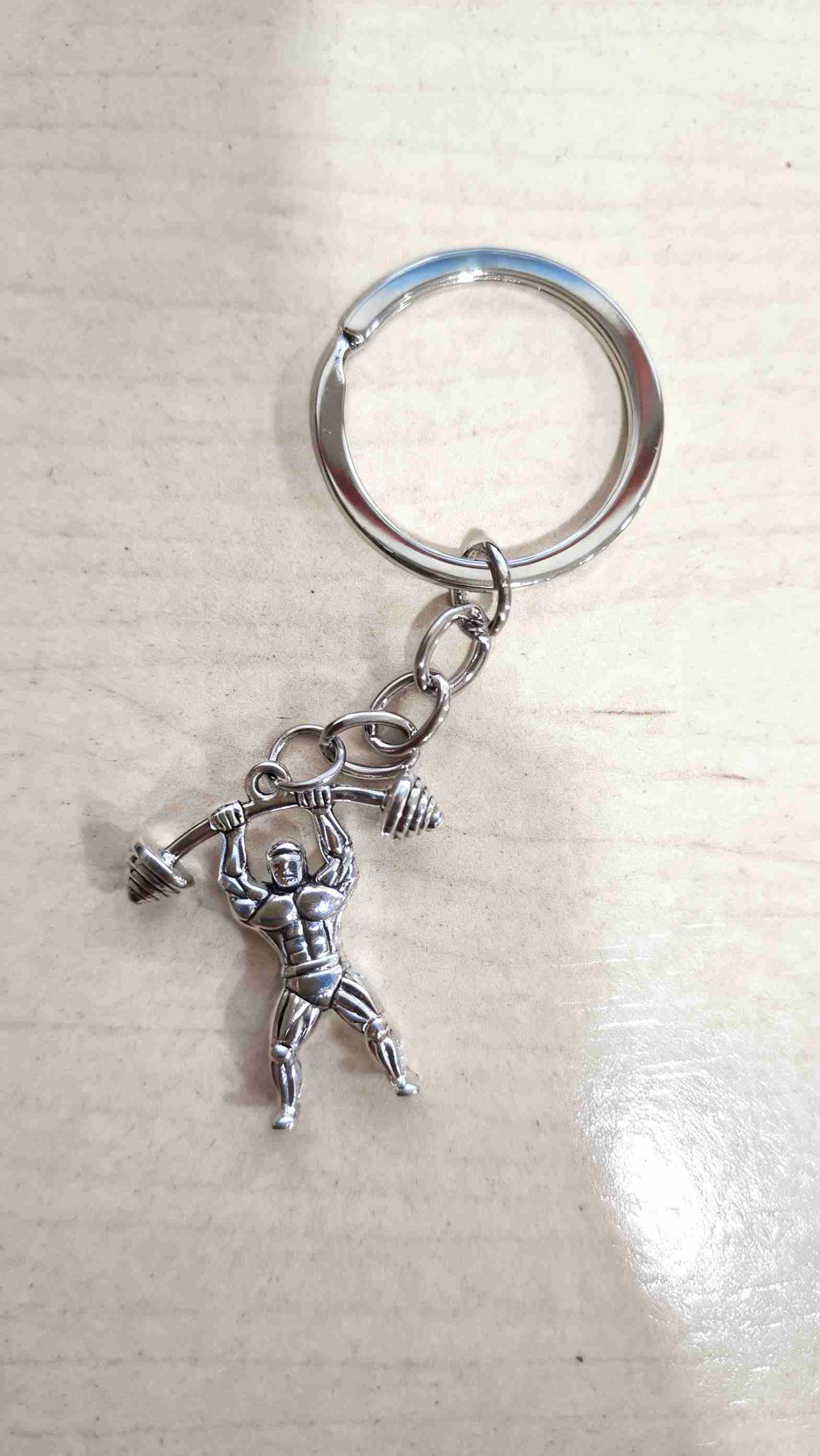 Llavero figura levantador de pesas