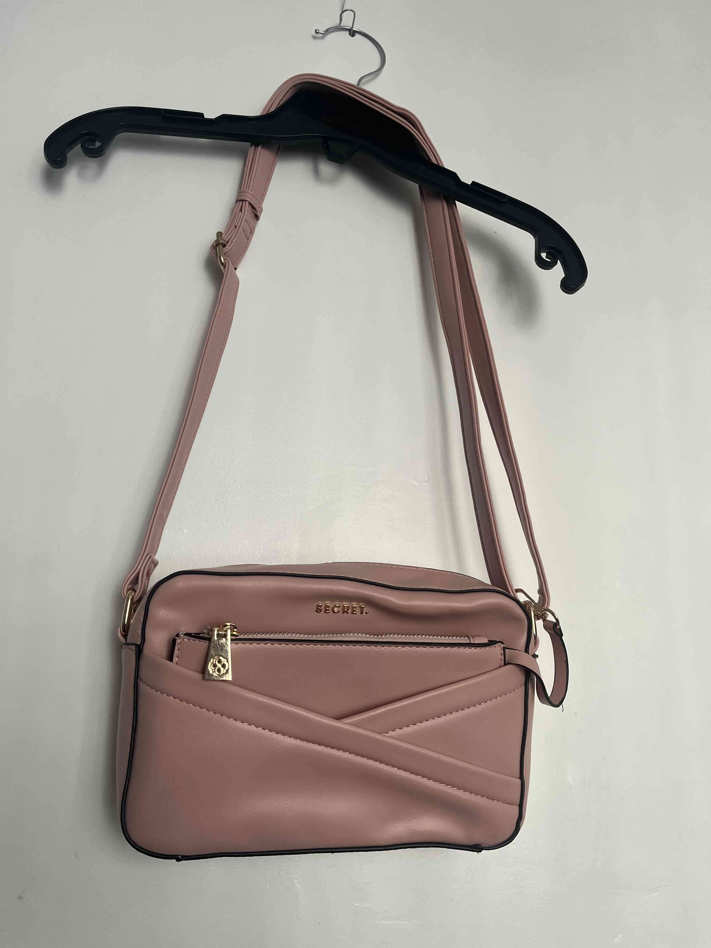 Cartera rosada Secret