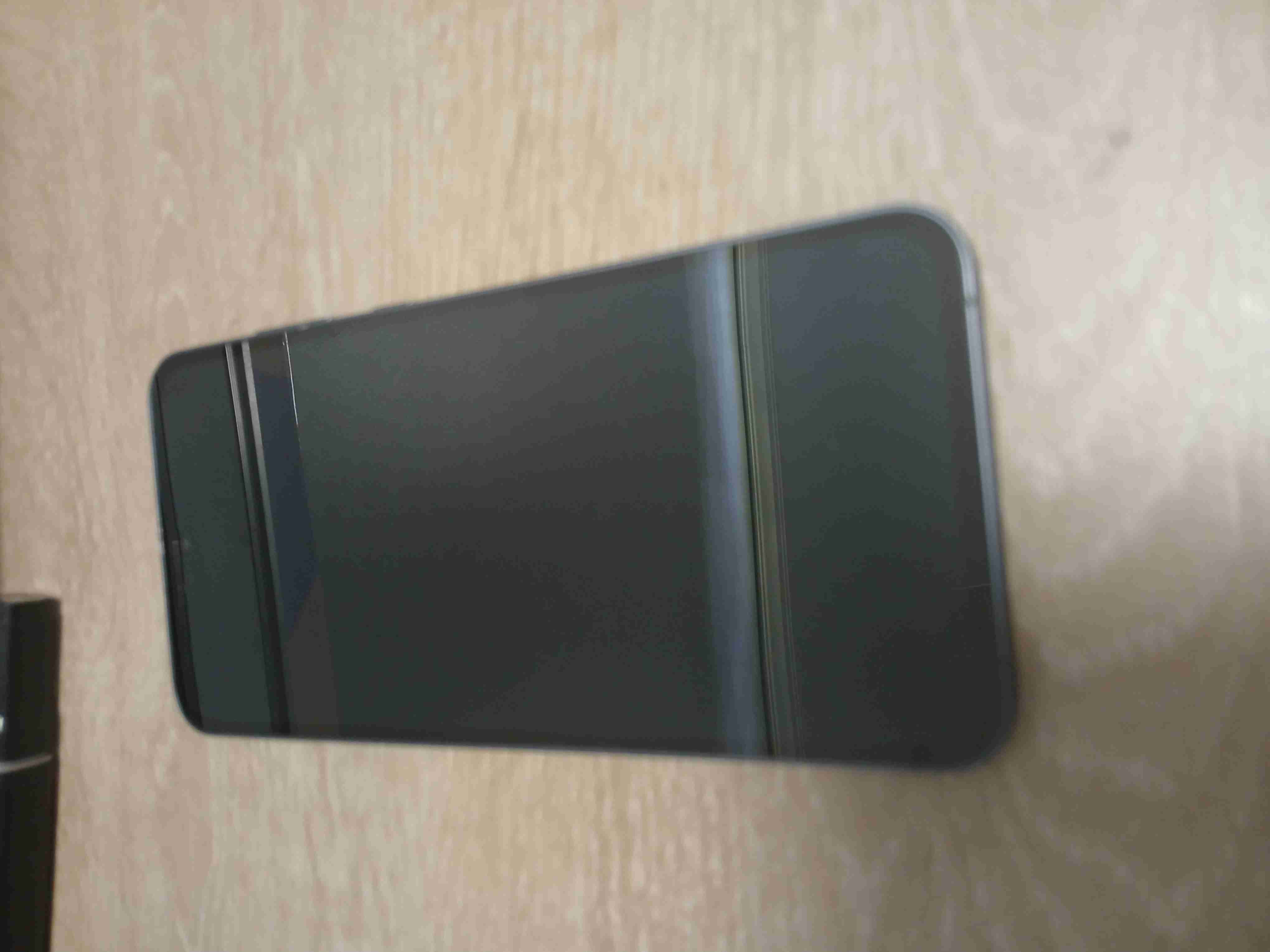 Teléfono inteligente negro - miniatura 3