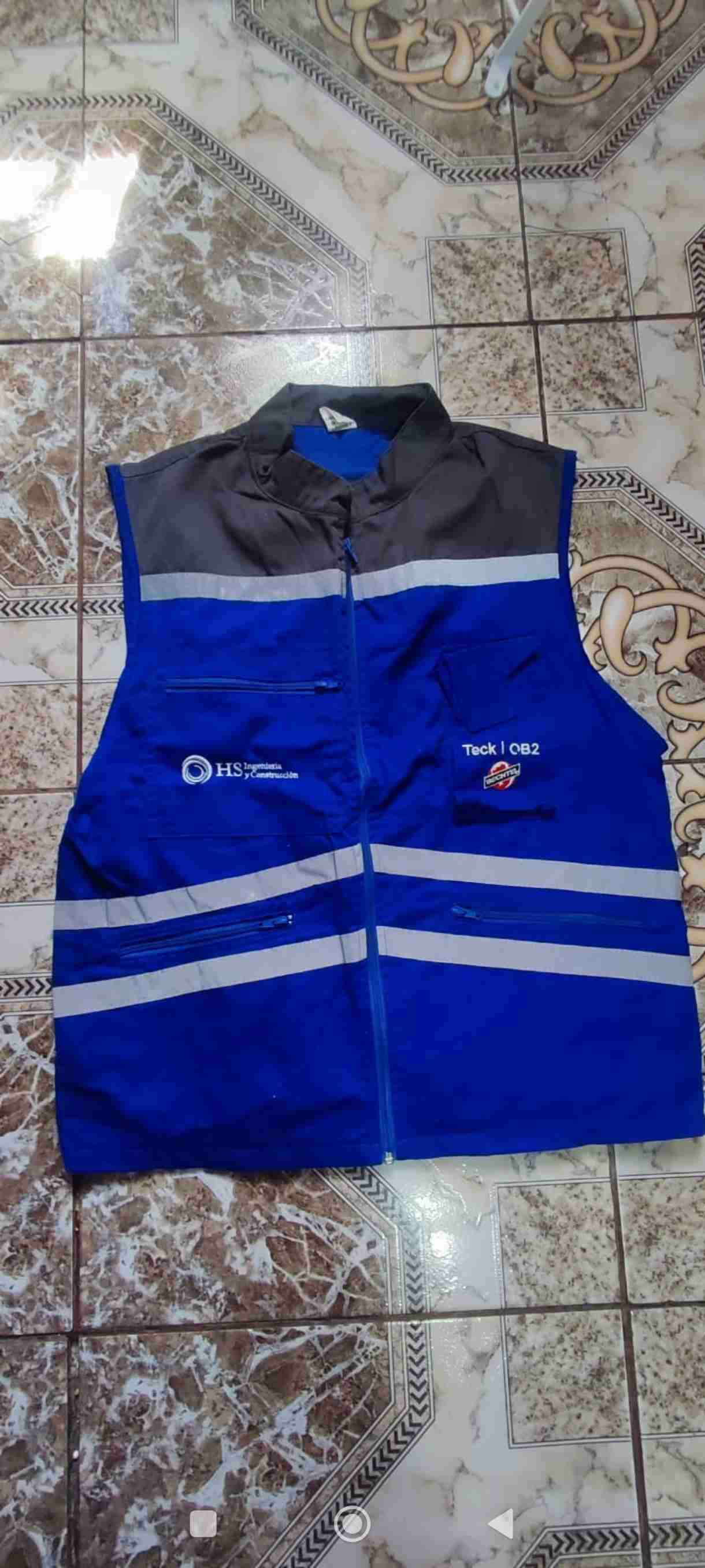 Chaleco reflectante naranja, azul y amarillo - miniatura 4