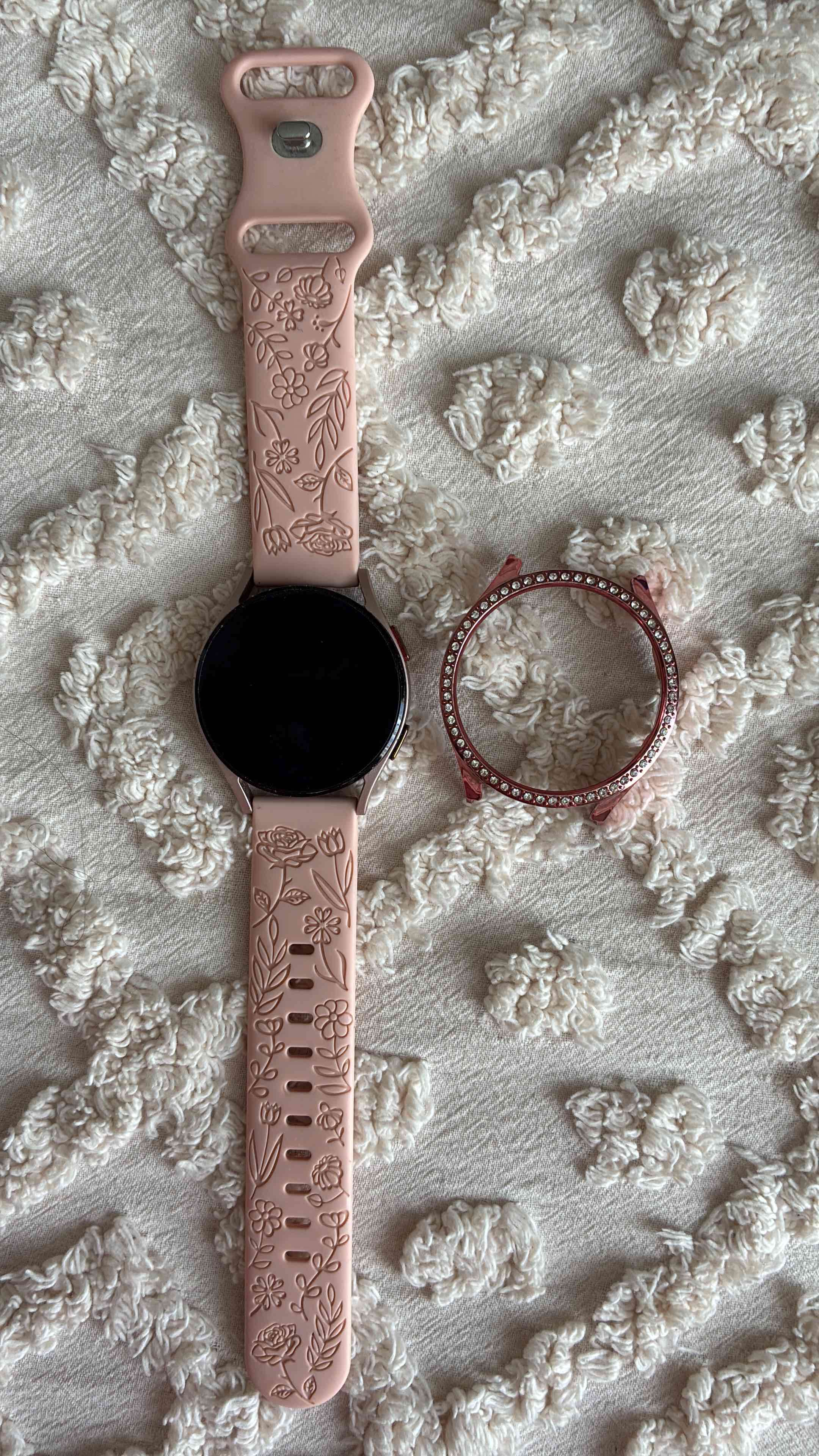 Smartwatch rosado con bisel brillante y audifonos - miniatura 2
