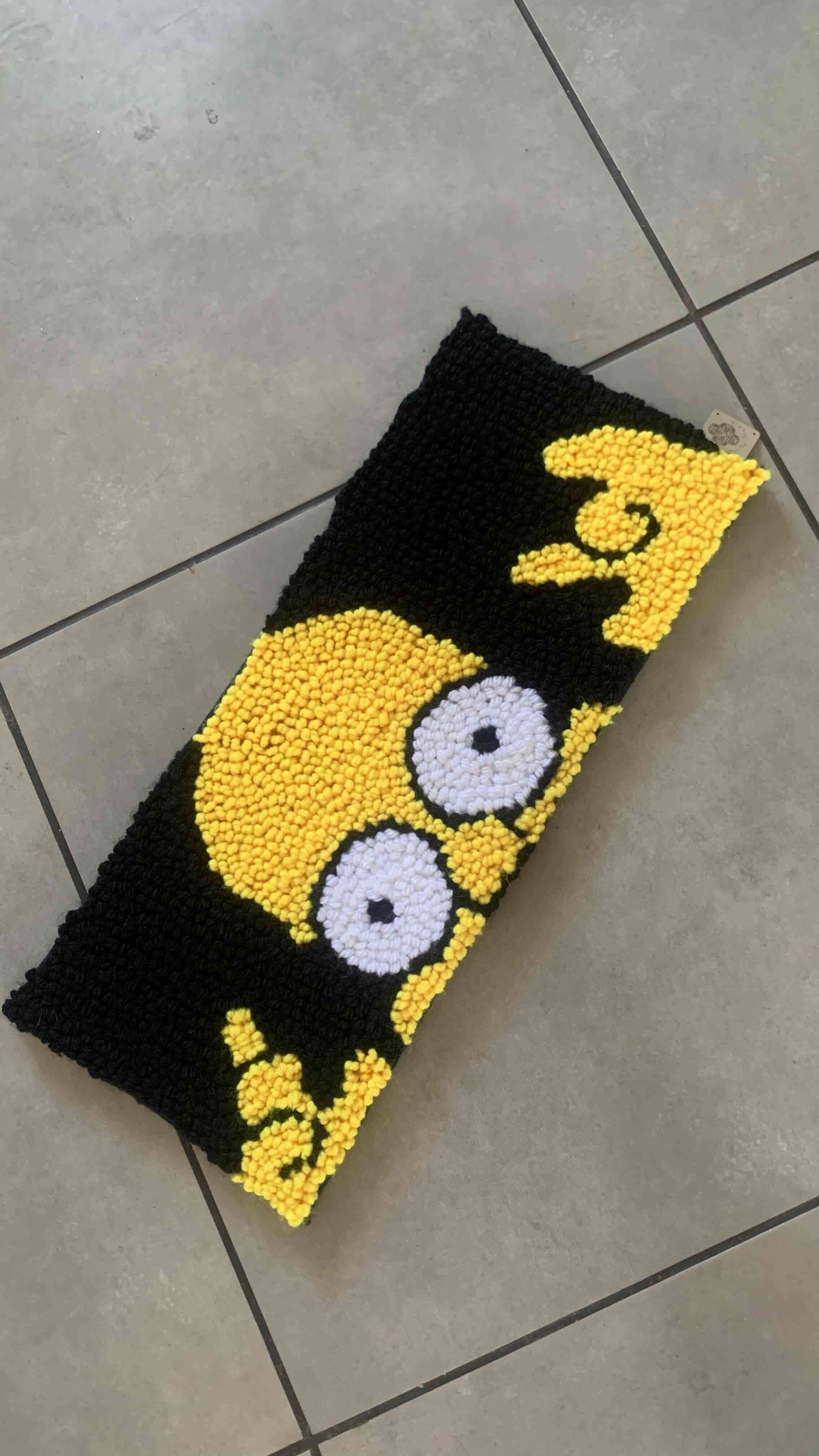 Alfombra tejida diseño divertido