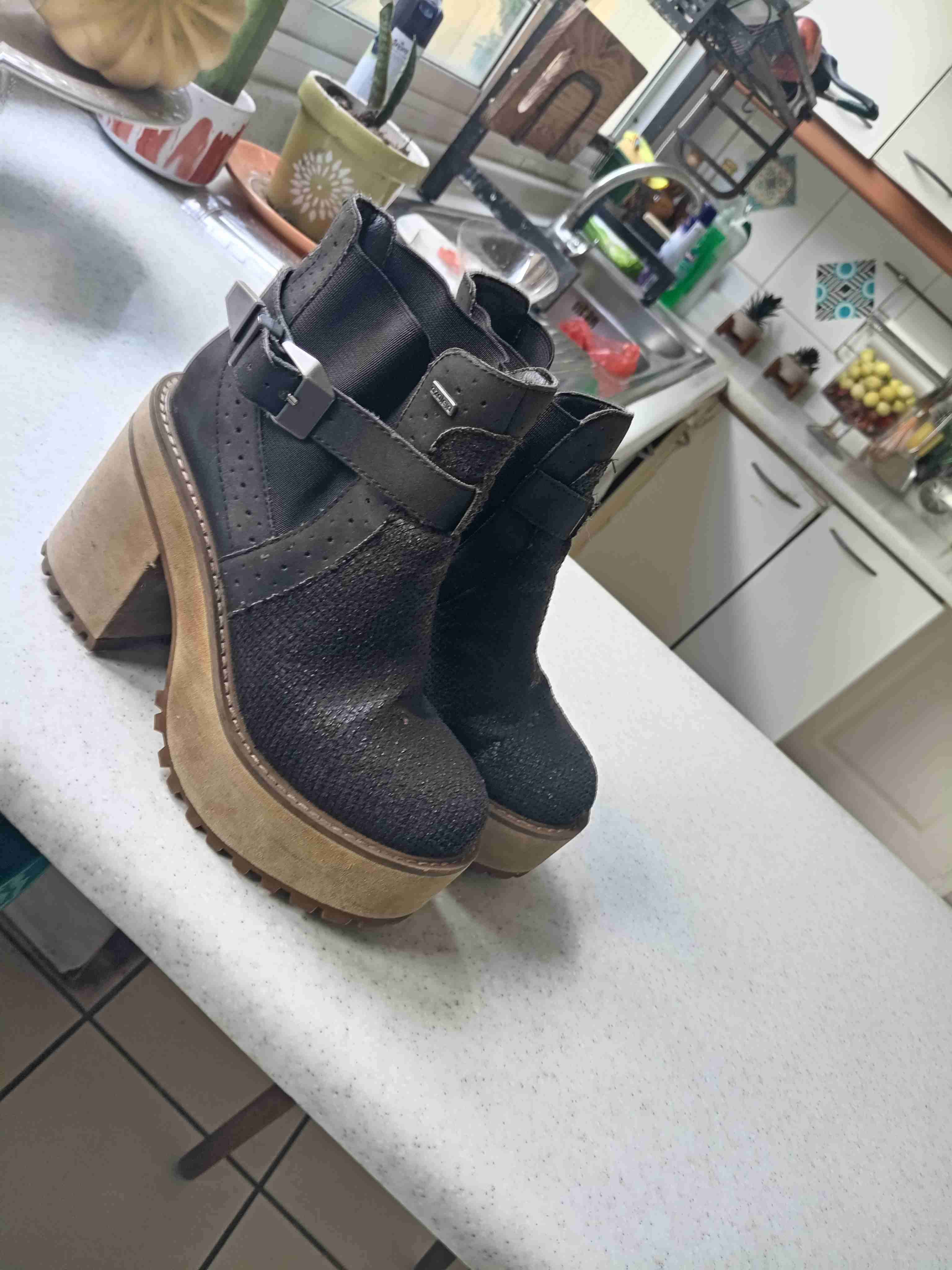 Botines de cuero con taco alto