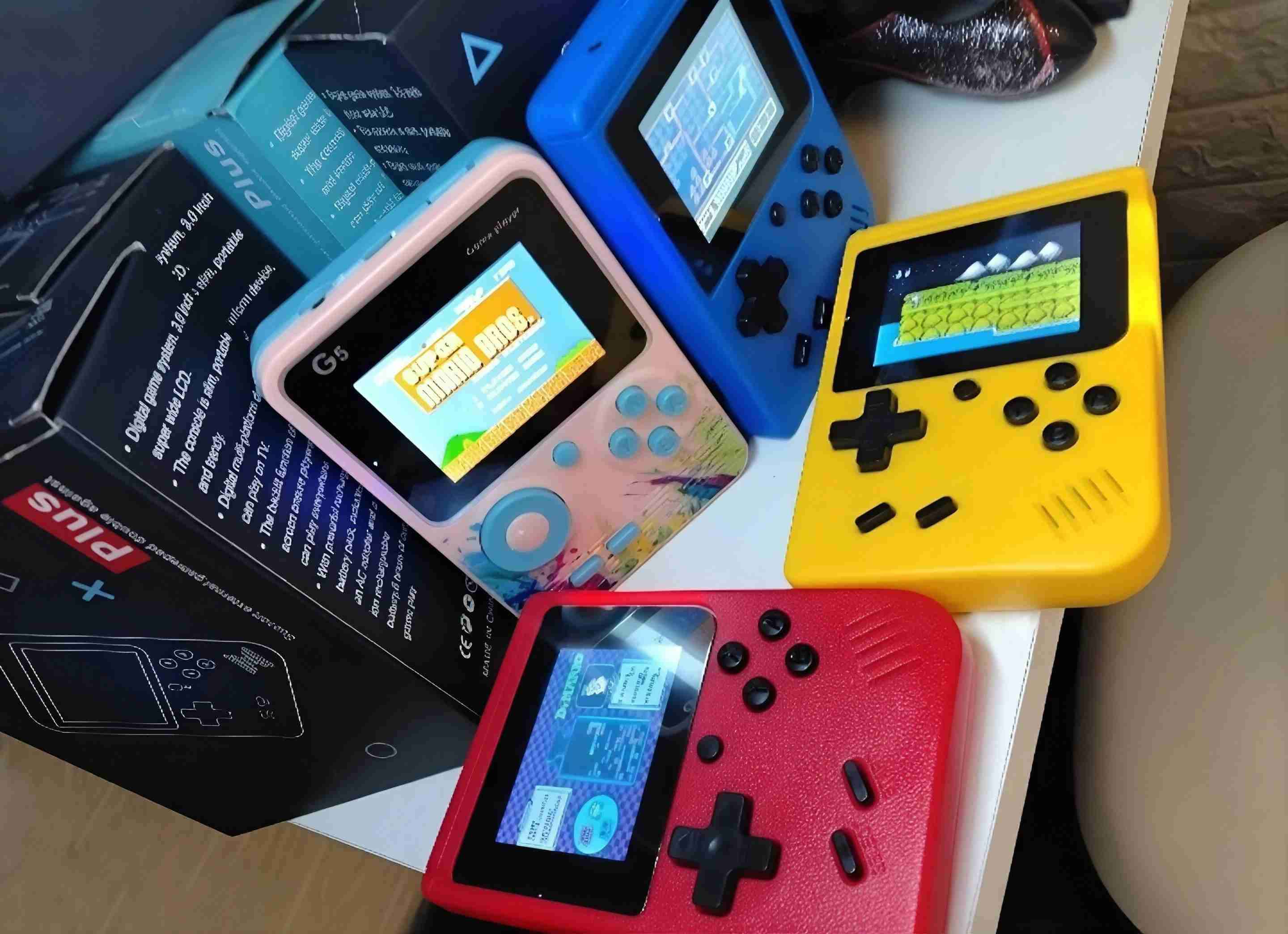 Consola portátil retro mini más de 400 juegos 8bit - miniatura 3