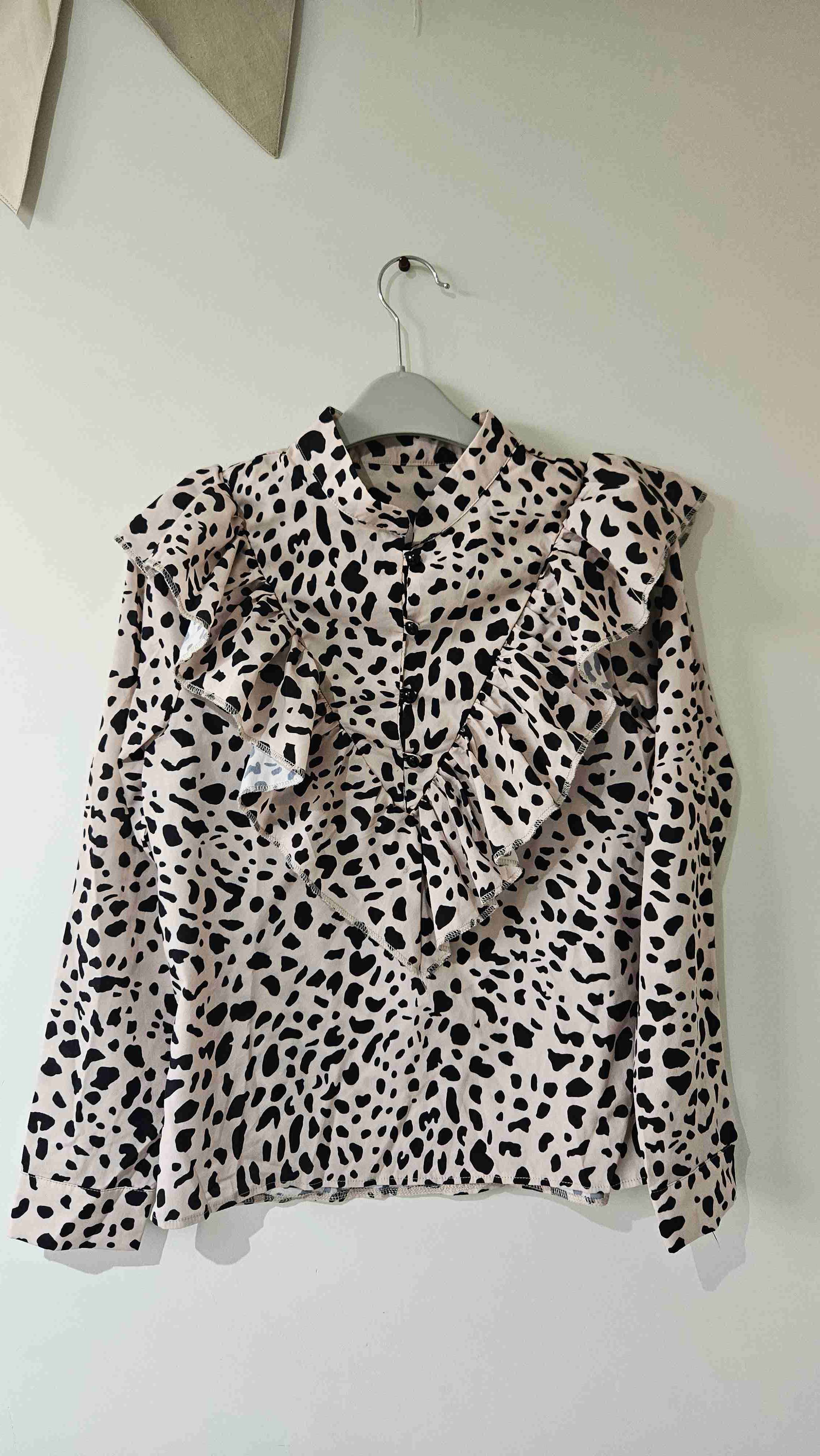 Blusa animal print con volantes