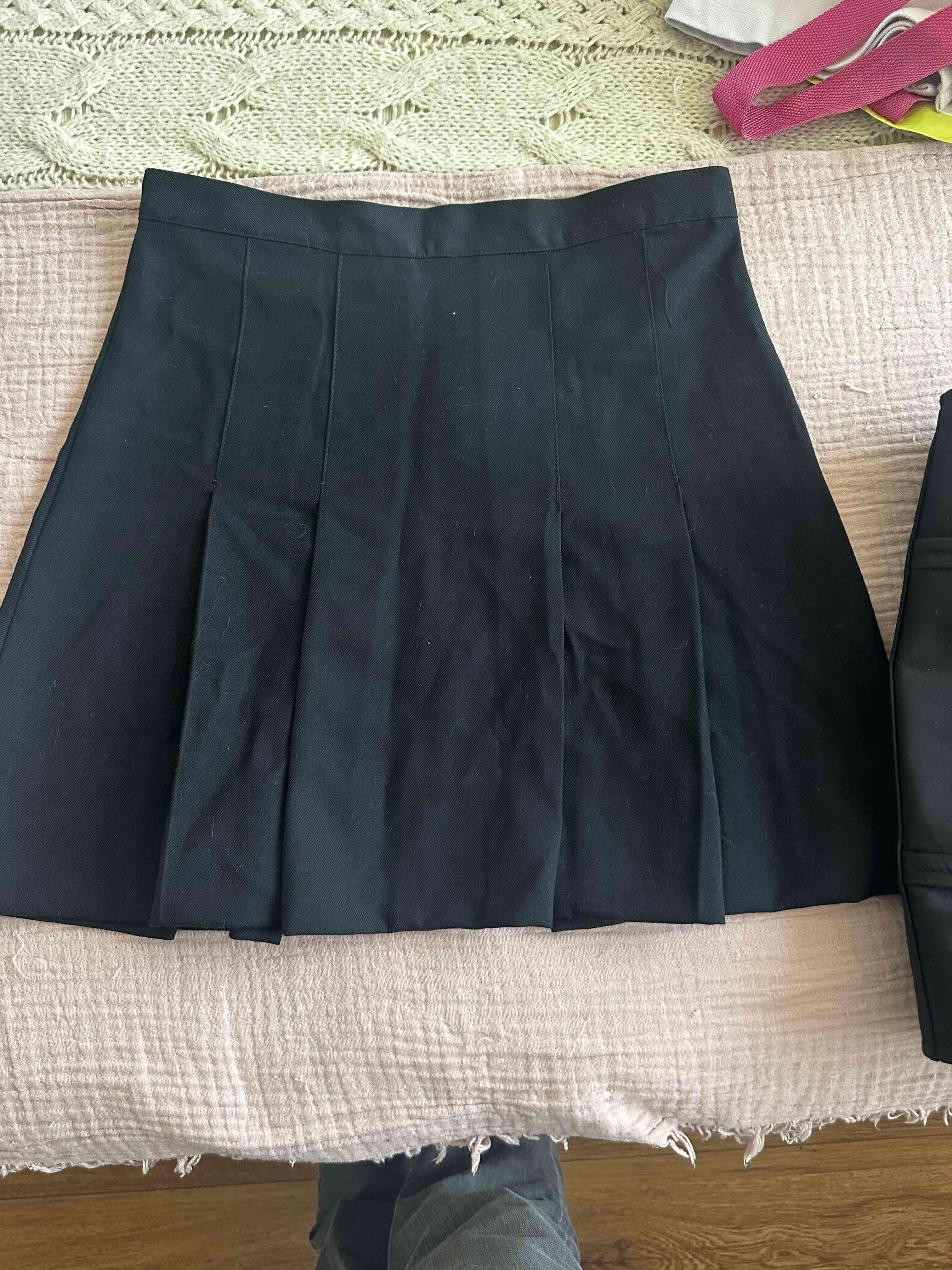 Falda plisada negra