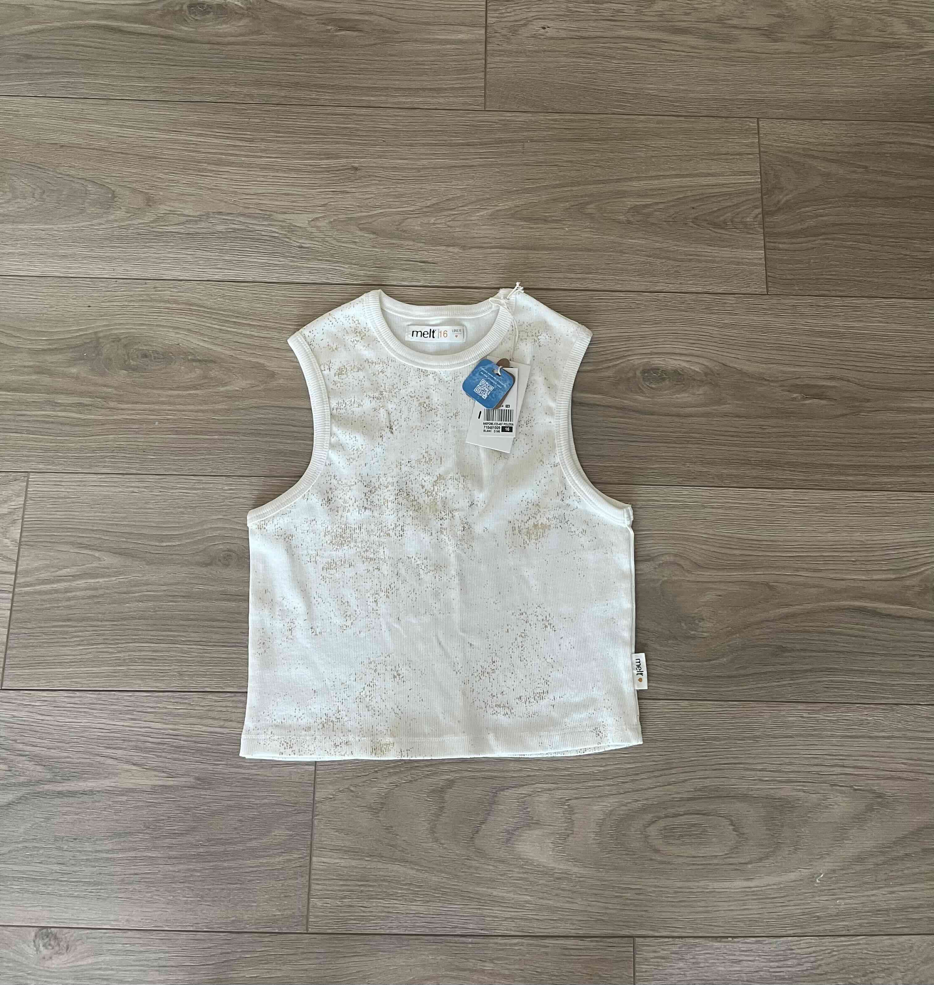Polera blanca con brillos talla 16 niña.